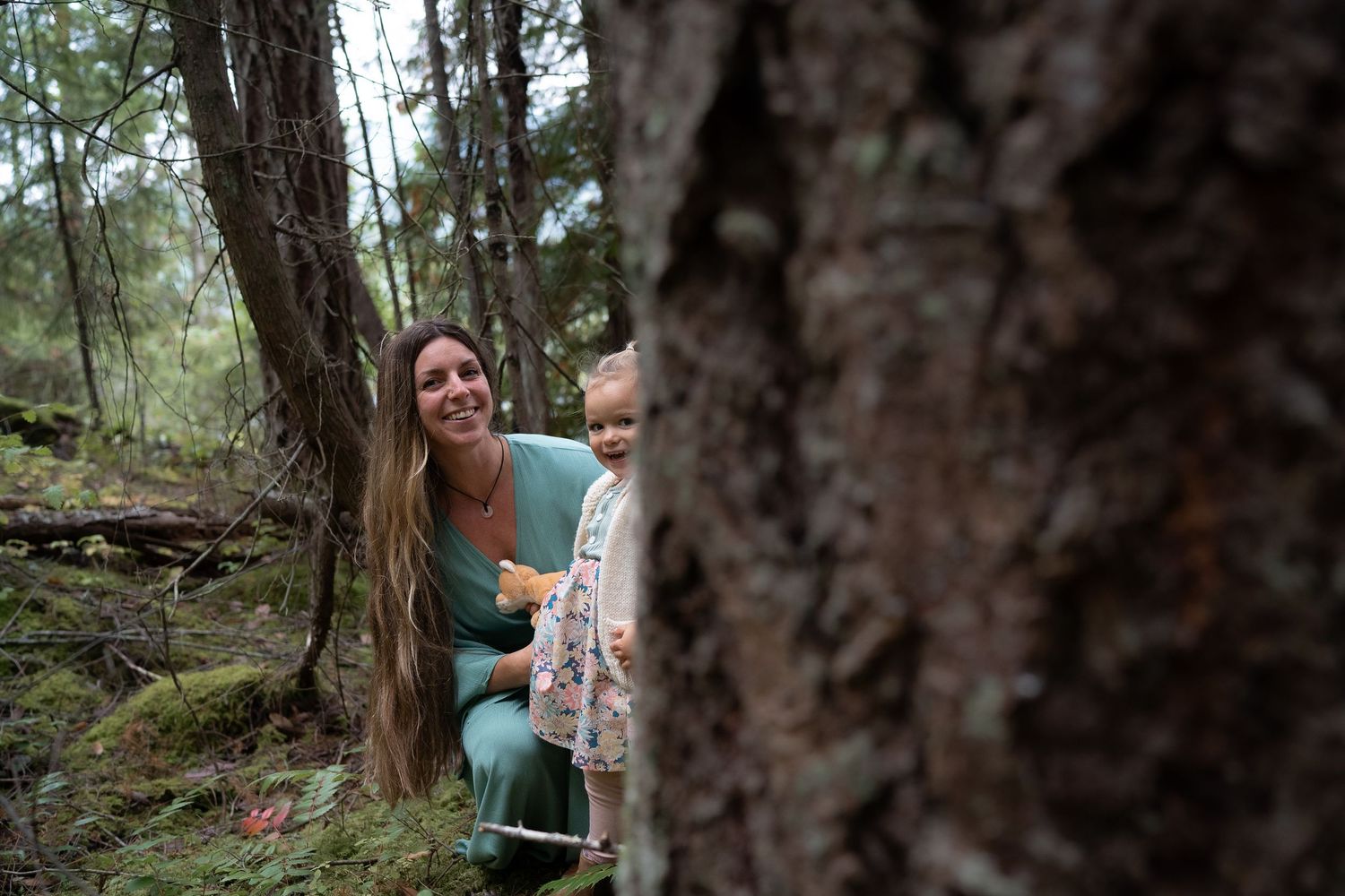 Nanaimo, BC family photographer capturing a joyful family playing together outdoors