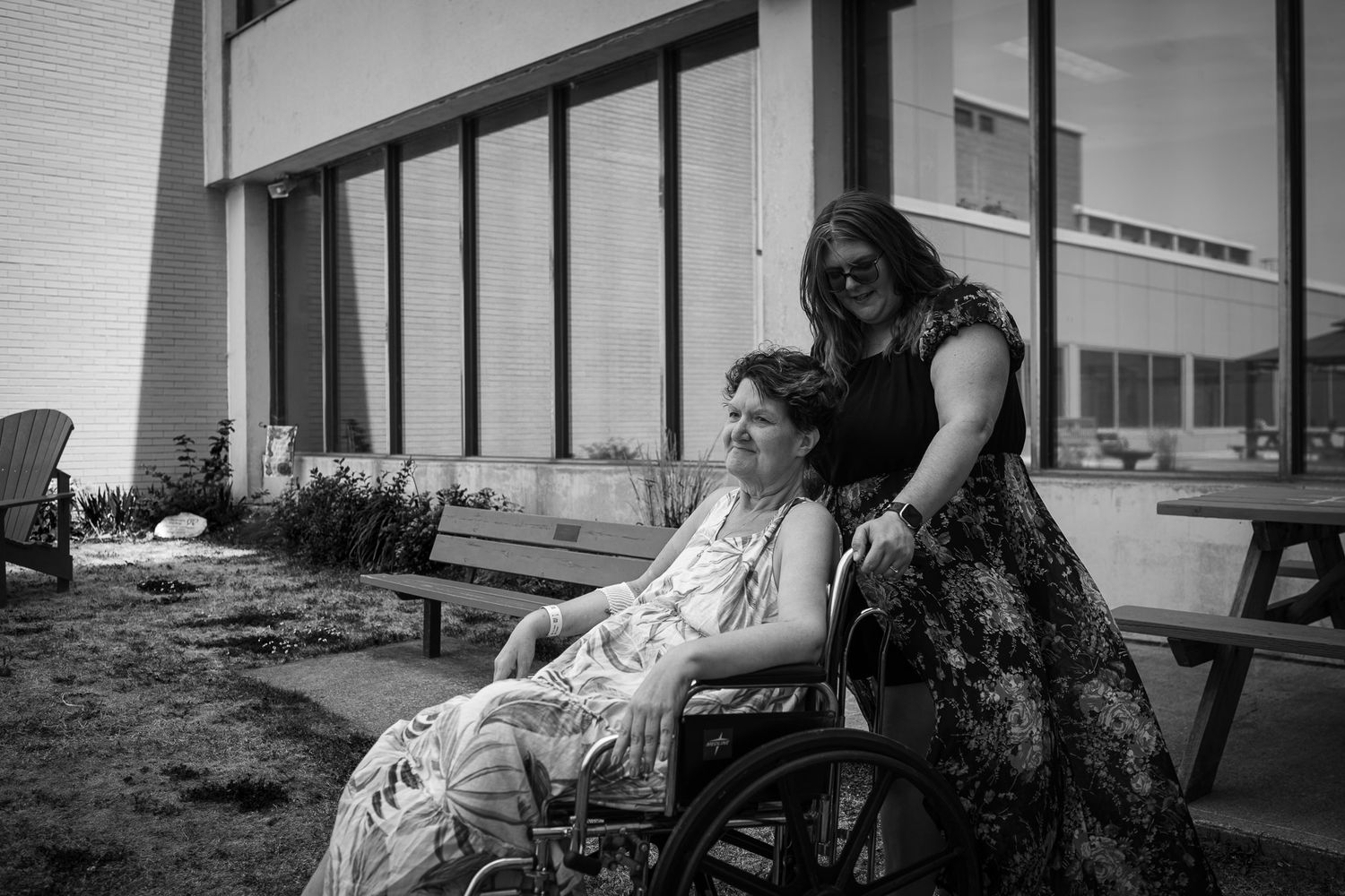 Series of black and white images showing tender moments between daughter and mother outdoors.