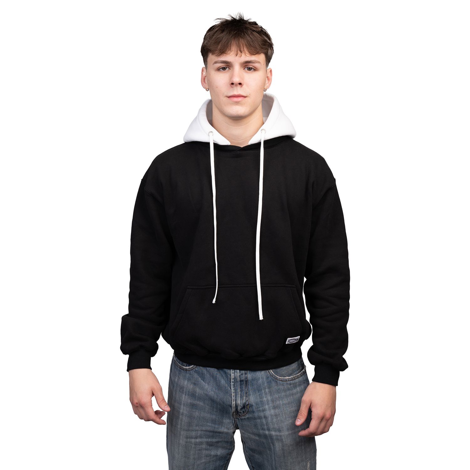 Young person wearing a black hoodie and jeans poses in three different casual stances against a white background.