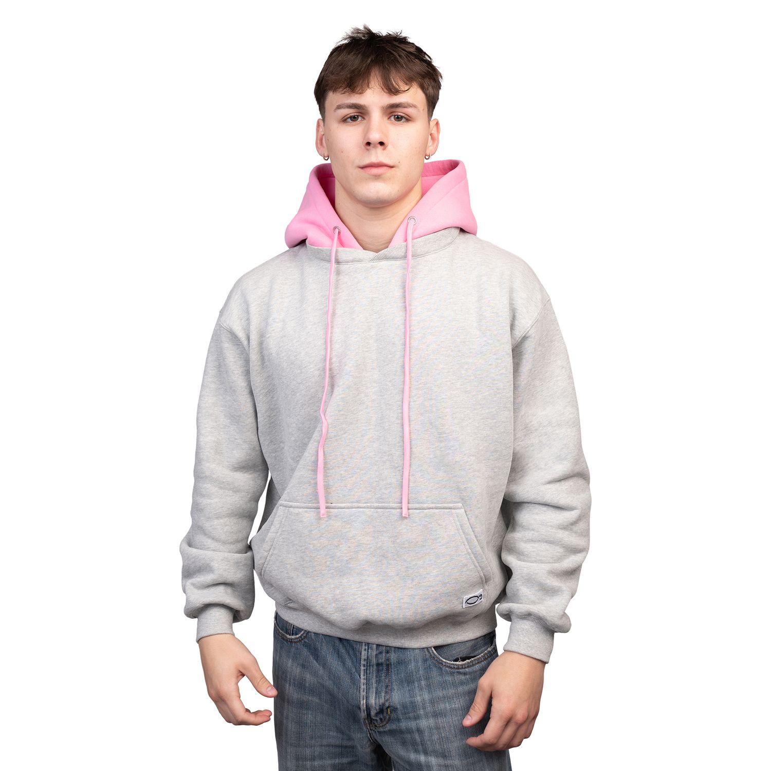 Person modeling a light gray hoodie with pink drawstrings in various angles.