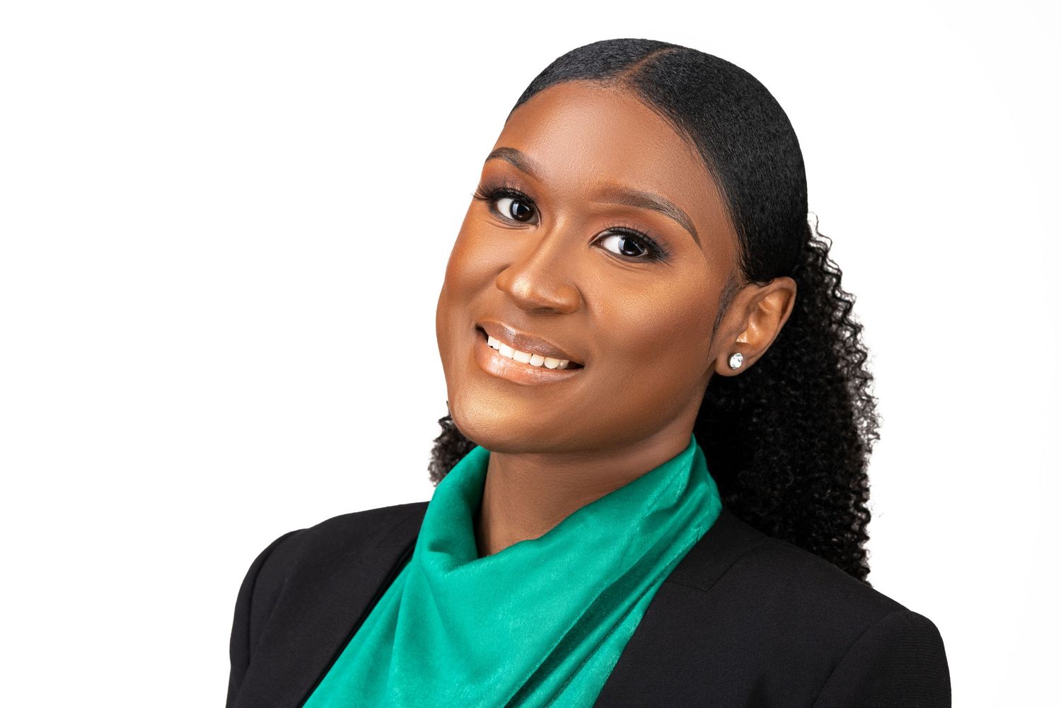 Professional portrait collage showing bright smiles and teal accents against a dark background.