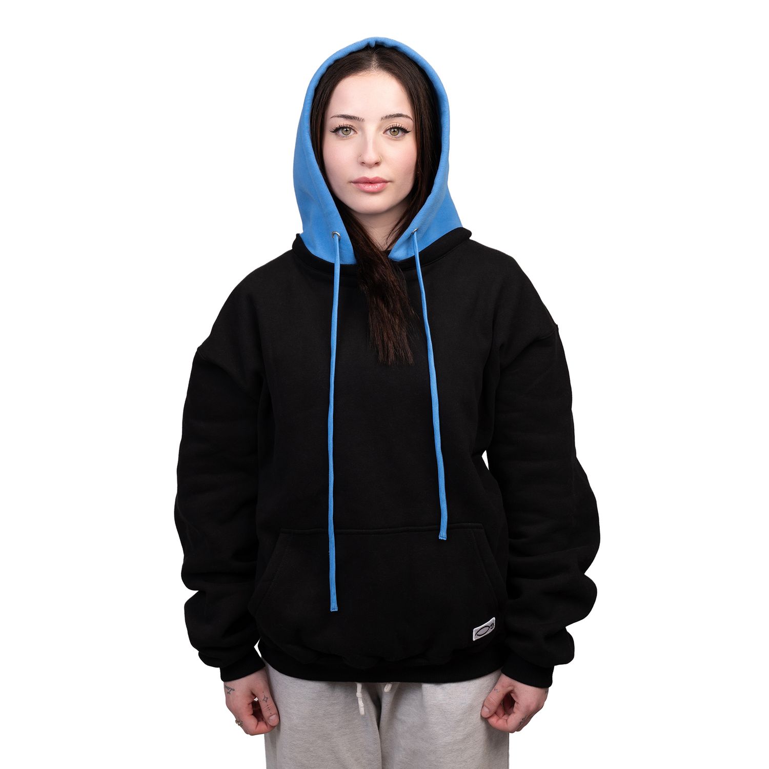 Person wearing a black hoodie with light blue drawstrings shown from different angles in a product photography setup.