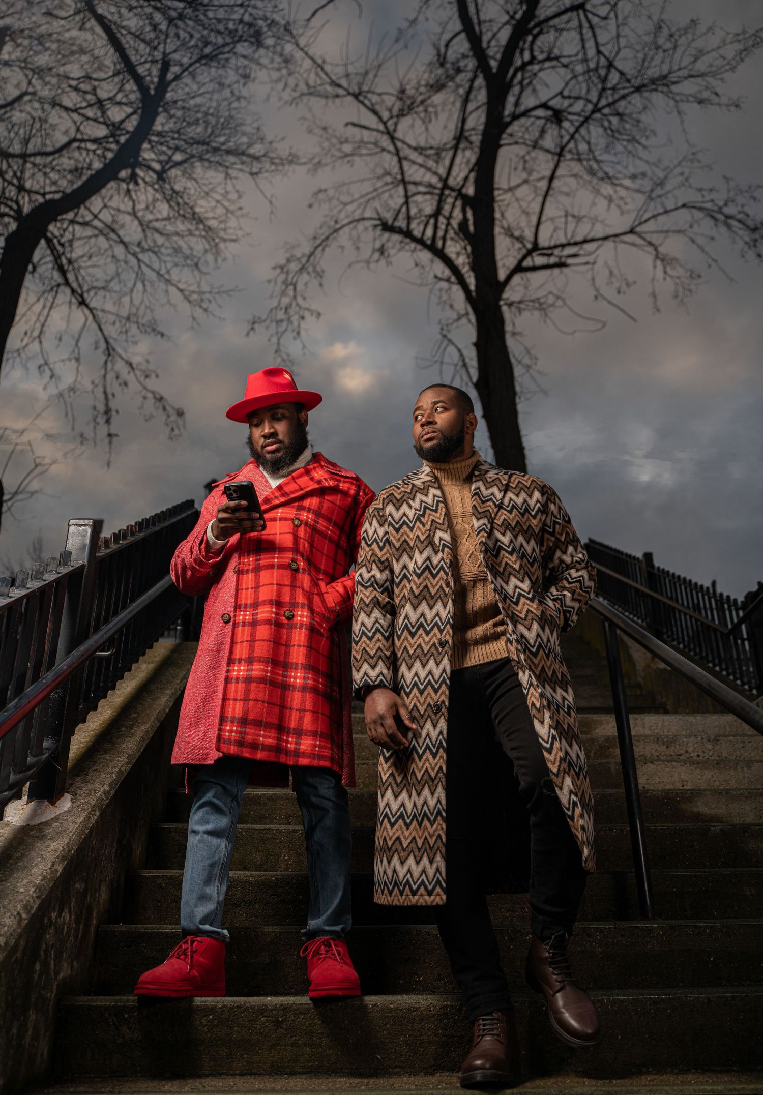 Three people pose together against a dramatic cloudy sky and bare winter trees in a multi-image sequence.