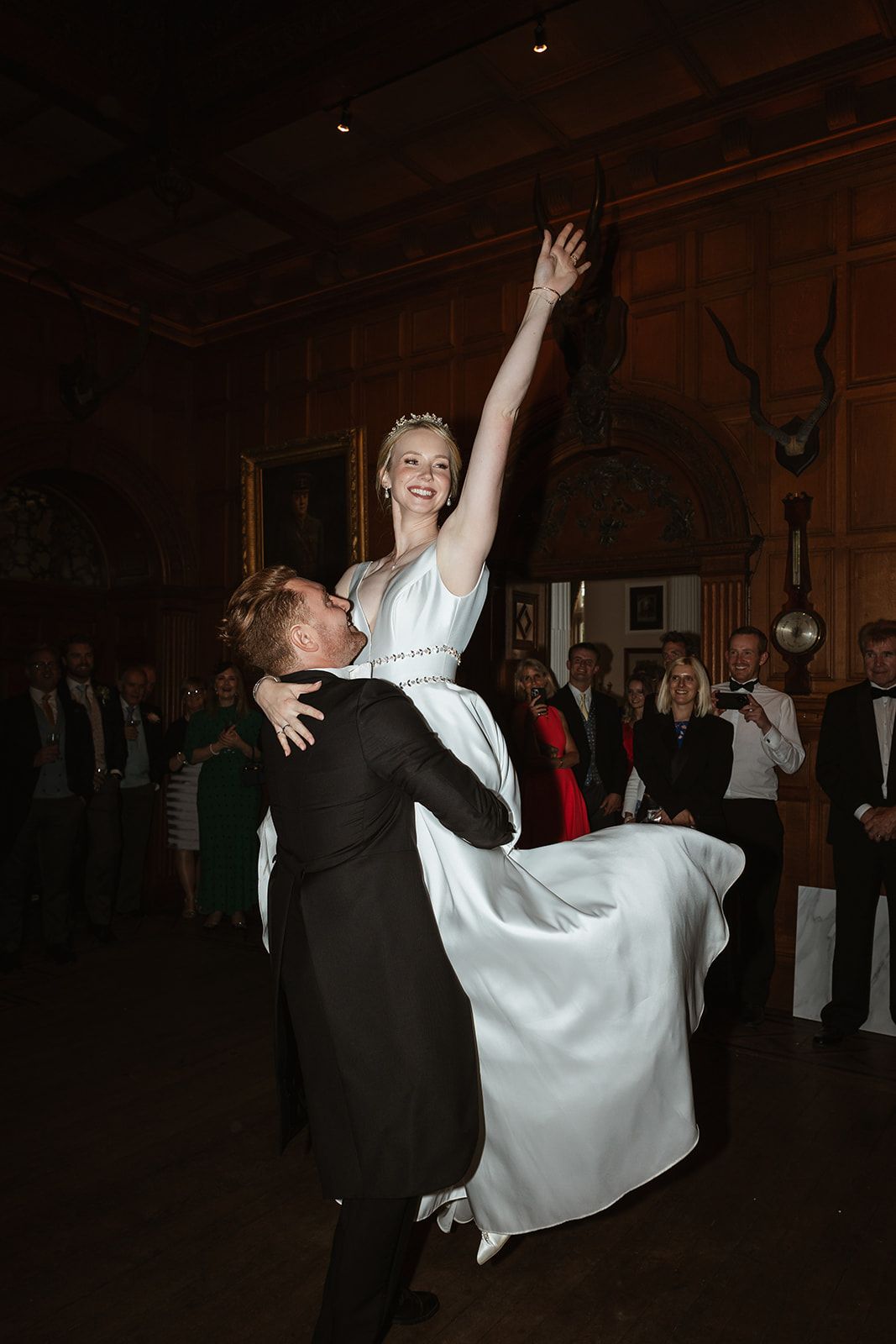 Groom lifts bride on the dance floor at Berwick House, Shrewsbury.