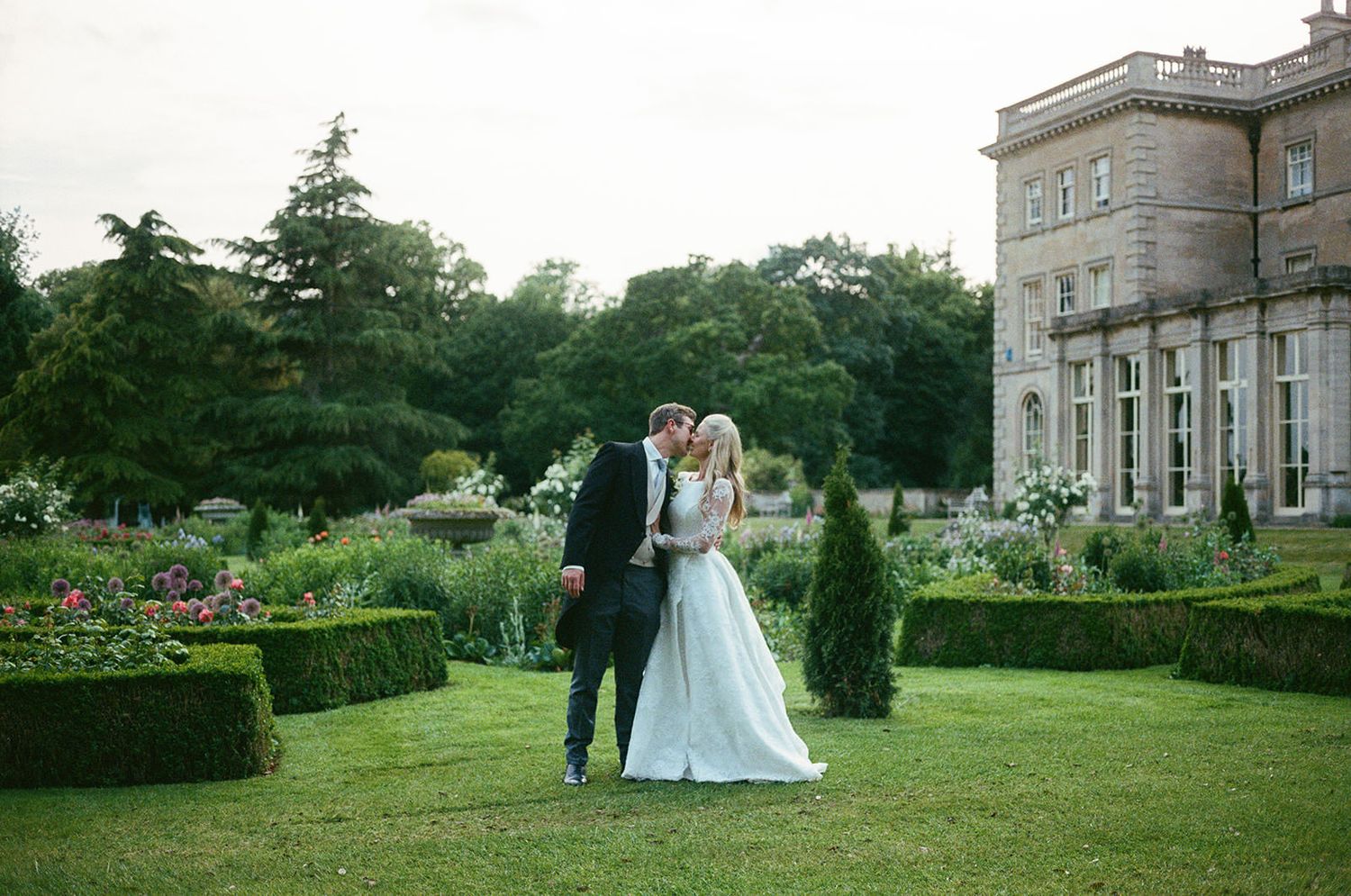 Couple kiss at Prestwold Hall in Leicestershire. Image is on 35mm Film.