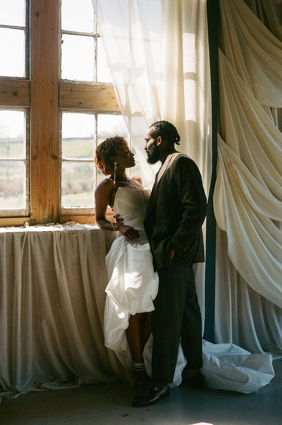 Couple portrait on 35mm film at The Giraffe Shed wedding venue in Newtown, Wales