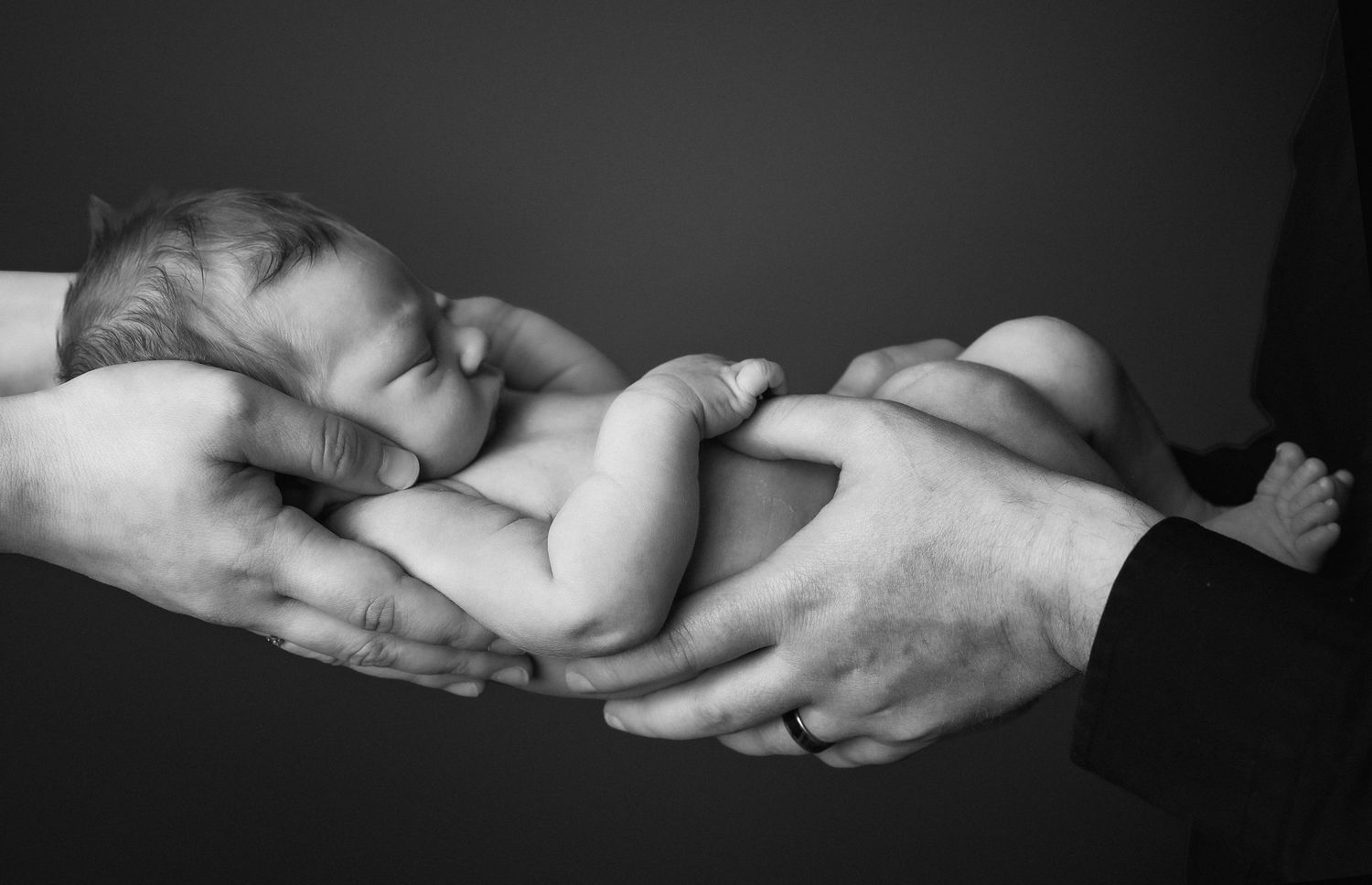 Black and white dramatic newborn baby photo. Southwest Wisconsin