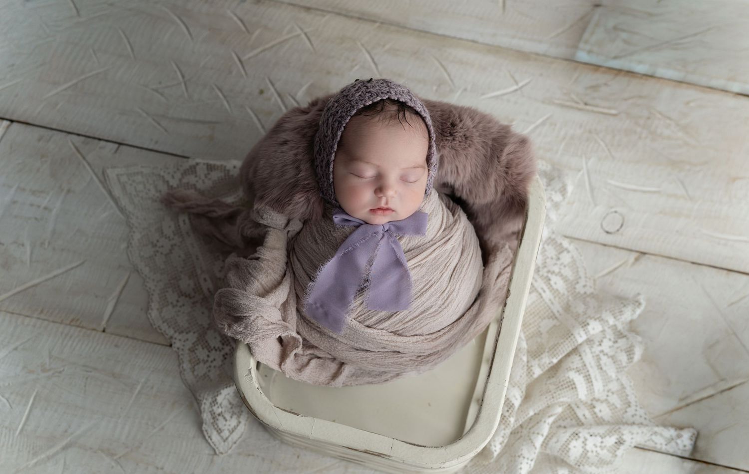 Baby in white basket. Newborn photography Baby pictures. Madison, WI