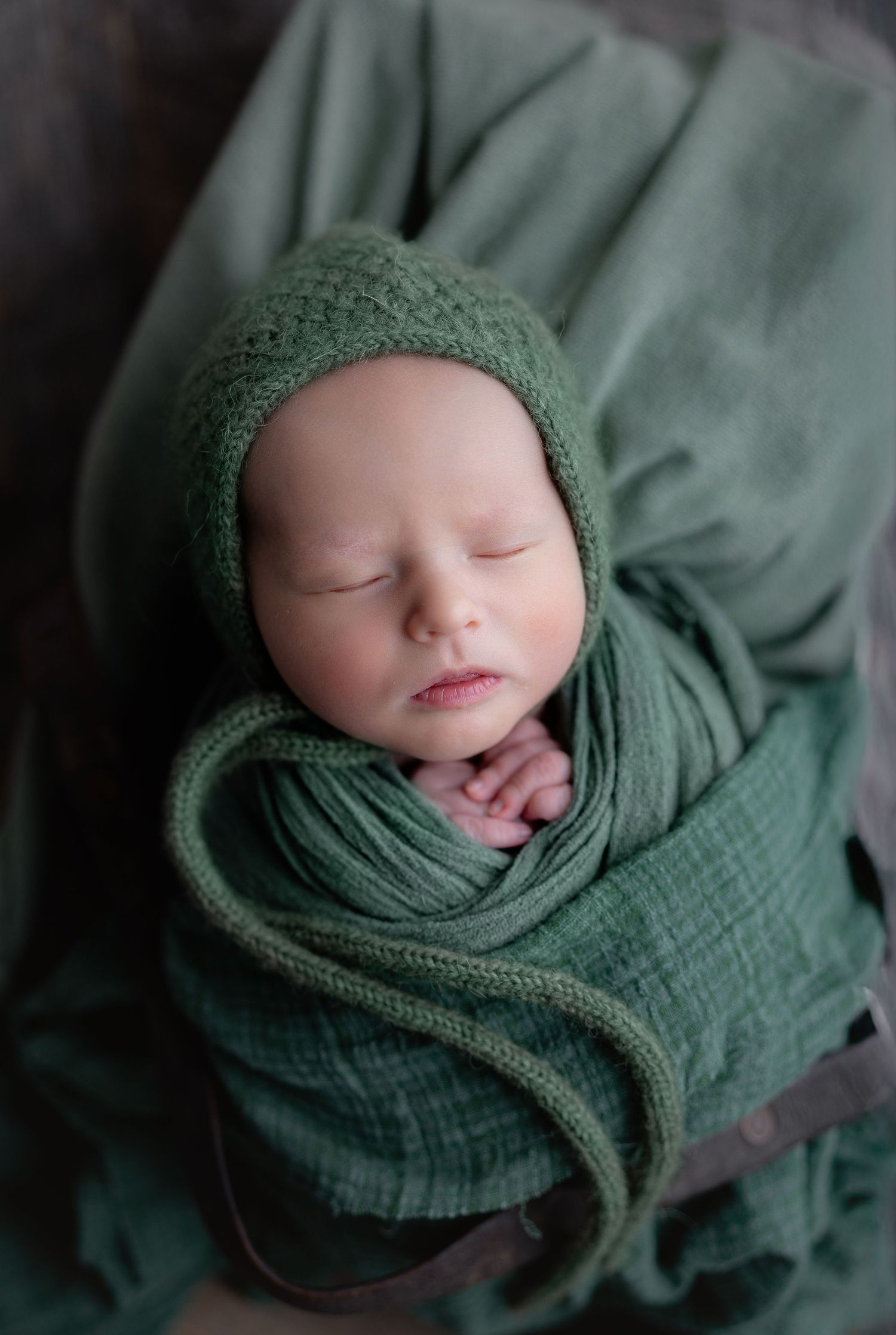 Baby in green. Hatched Newborn Photography