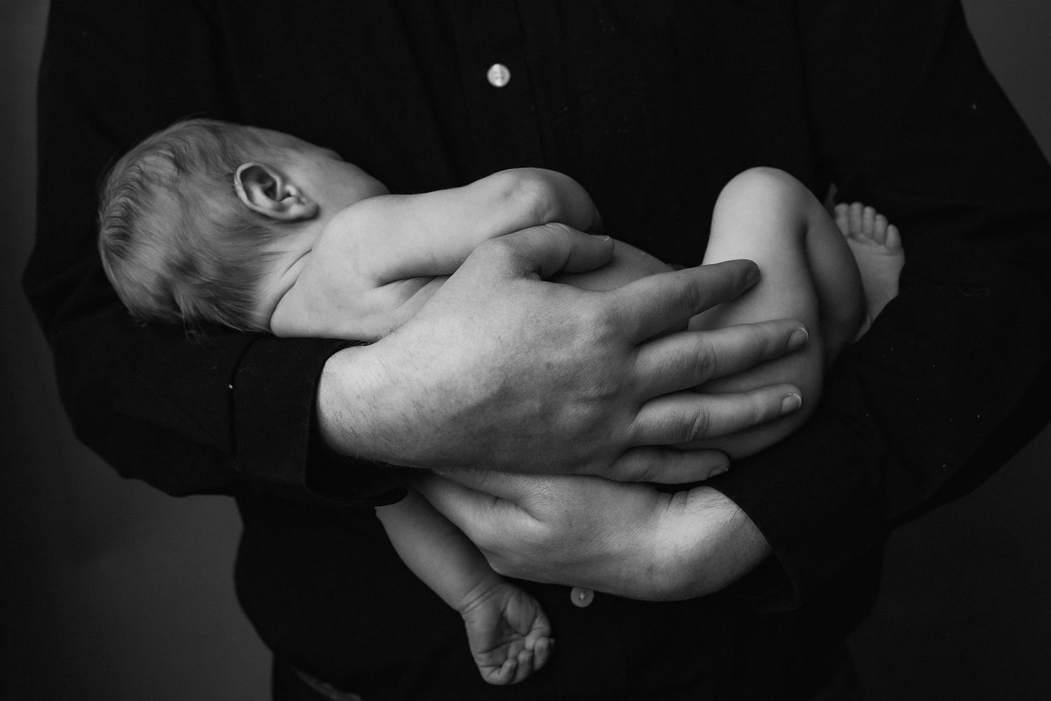 Black and white dramatic newborn baby photo. Southwest Wisconsin