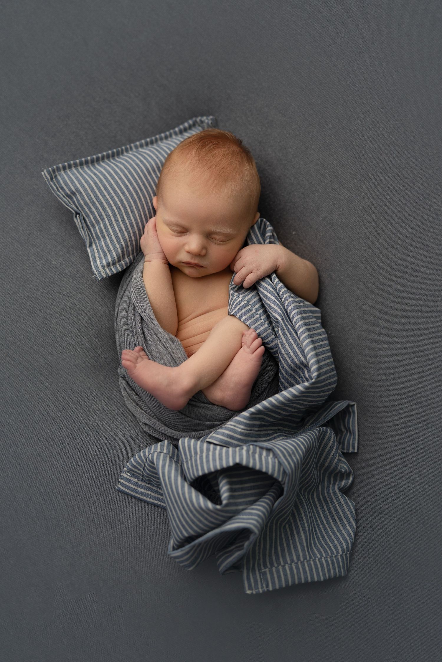 baby on blue backdrop
