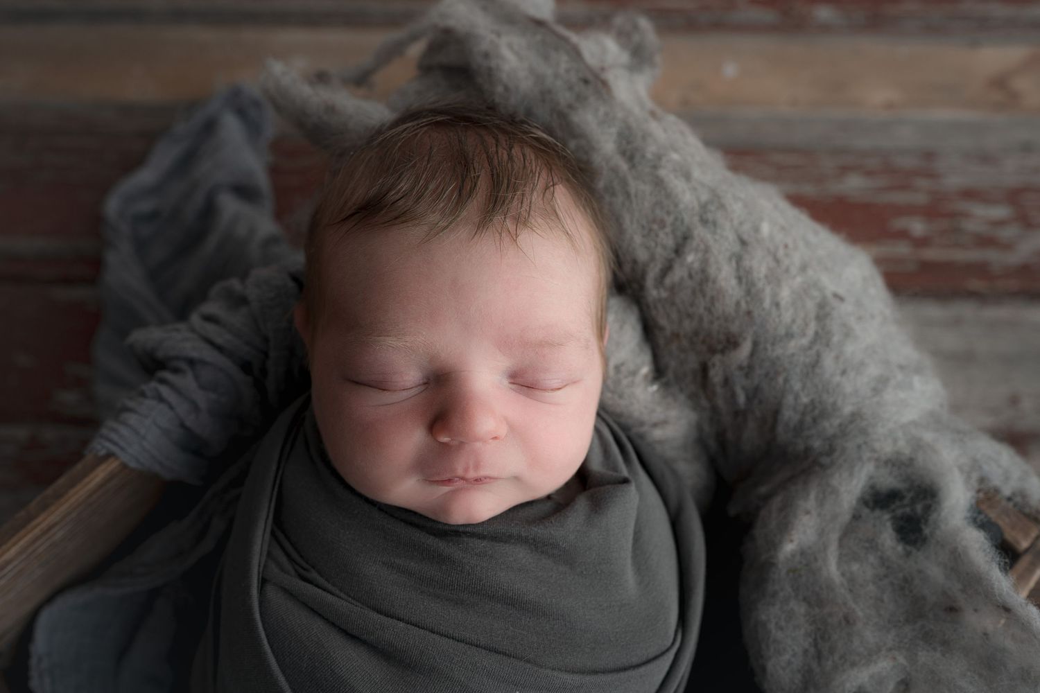 Baby in grey wrap. Baby picture. Madison, WI Mount Horeb, Wi Verona, WI Newborn Photography