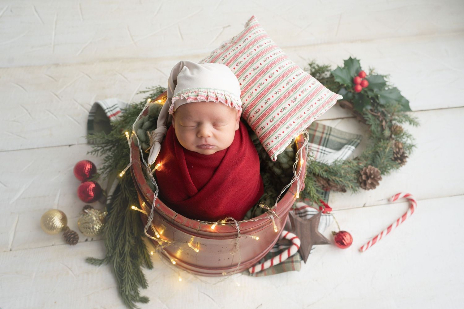 Baby dressed for Christmas with lights. Madison, WI