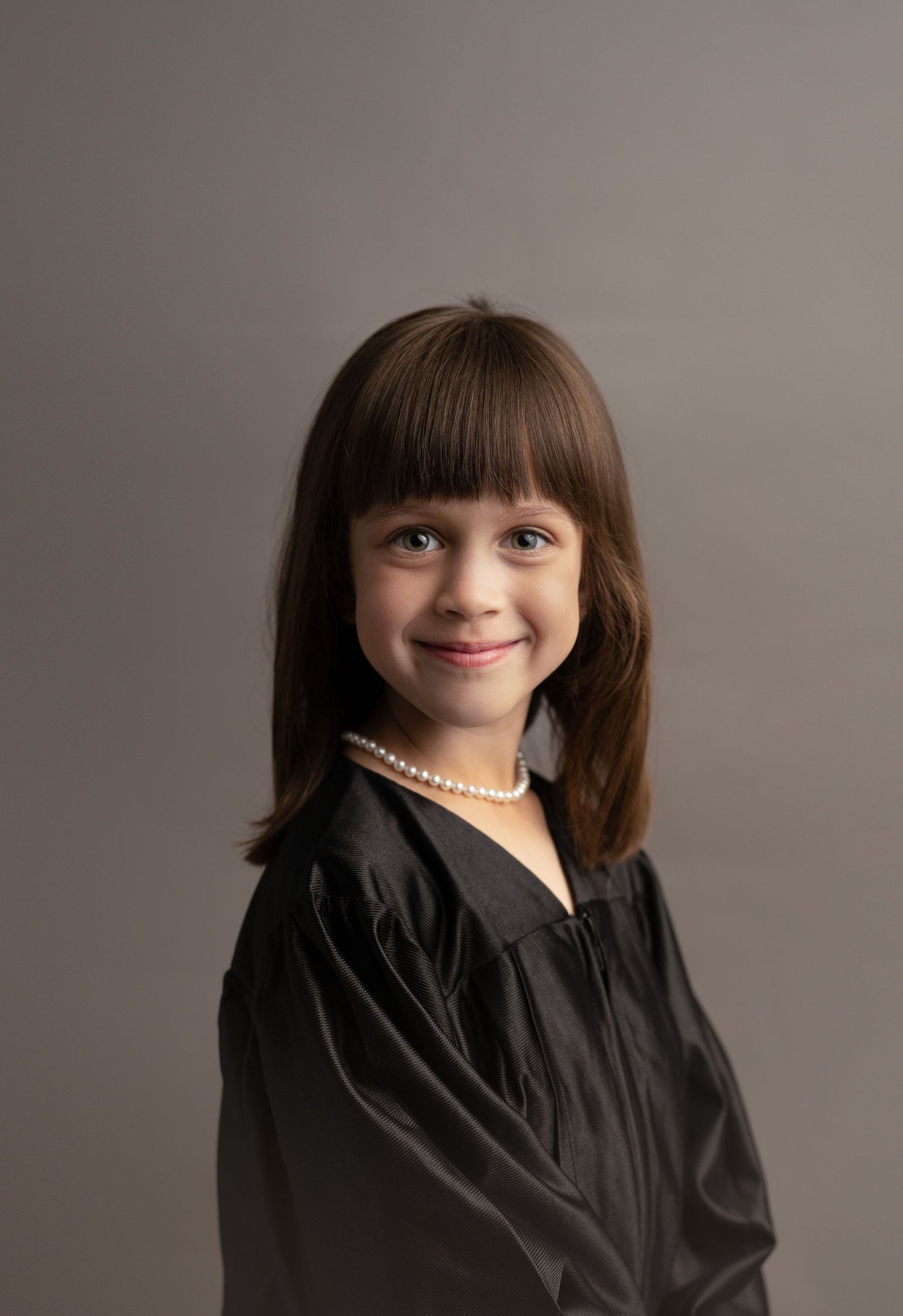 Kindergarten Graduation Photo. Beautiful family smiling for photos. Serving Madison, Verona, Mount Horeb, Middleton and Sun Prairie, Wiscons