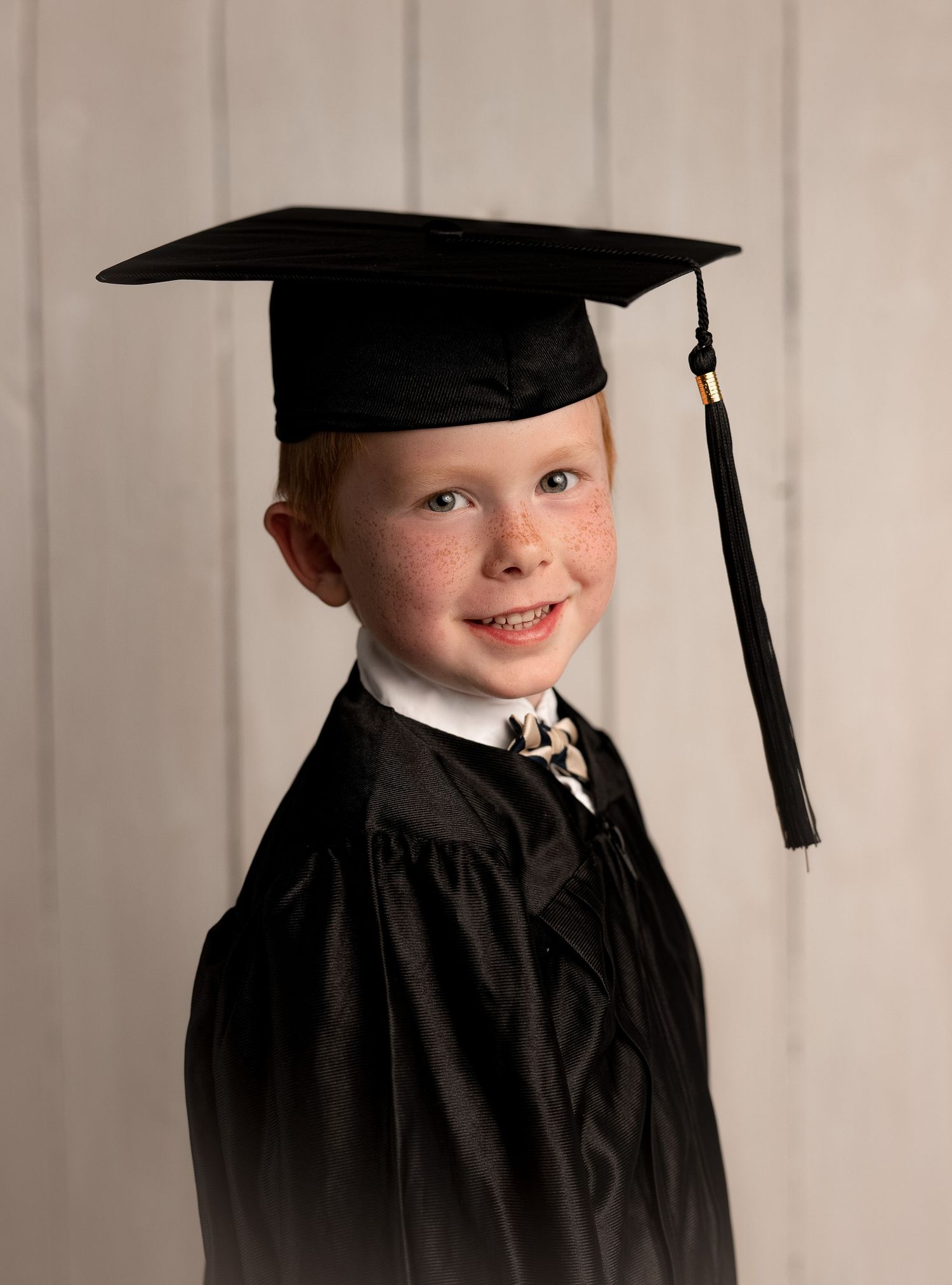 Kindergarten Graduation Photo. Beautiful family smiling for photos. Serving Madison, Verona, Mount Horeb, Middleton and Sun Prairie, Wiscons