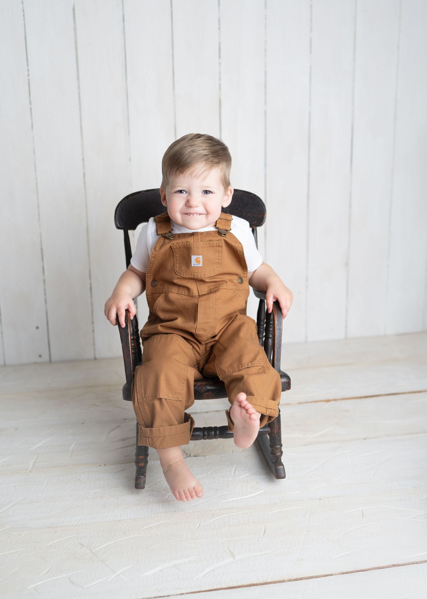 Milestone photo, toddler smiling in studio, newborn milestone photography Madison, WI