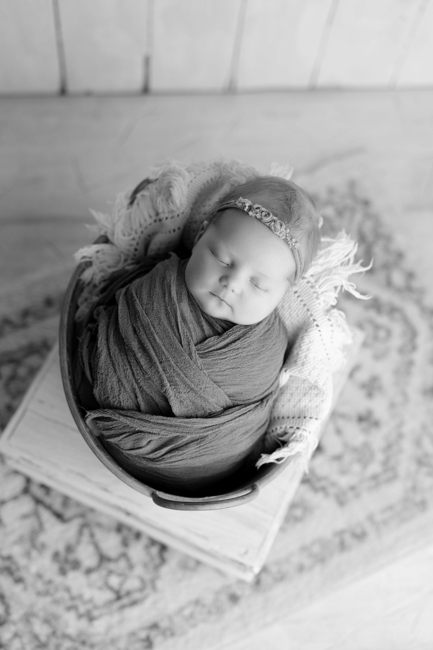 Newborn in basket with cute props, studio photography Madison, Verona, Middleton, Mount Horeb, Sun Prairie, Wisconsin and surrounding area.