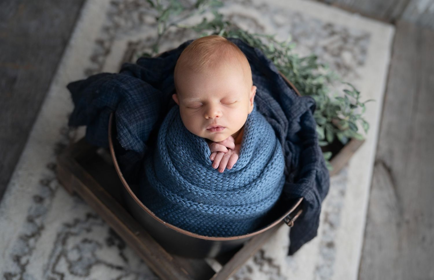 baby in bucket