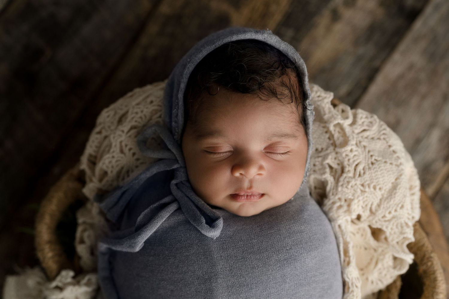 Cozy studio newborn with props, professional photography Madison, WI