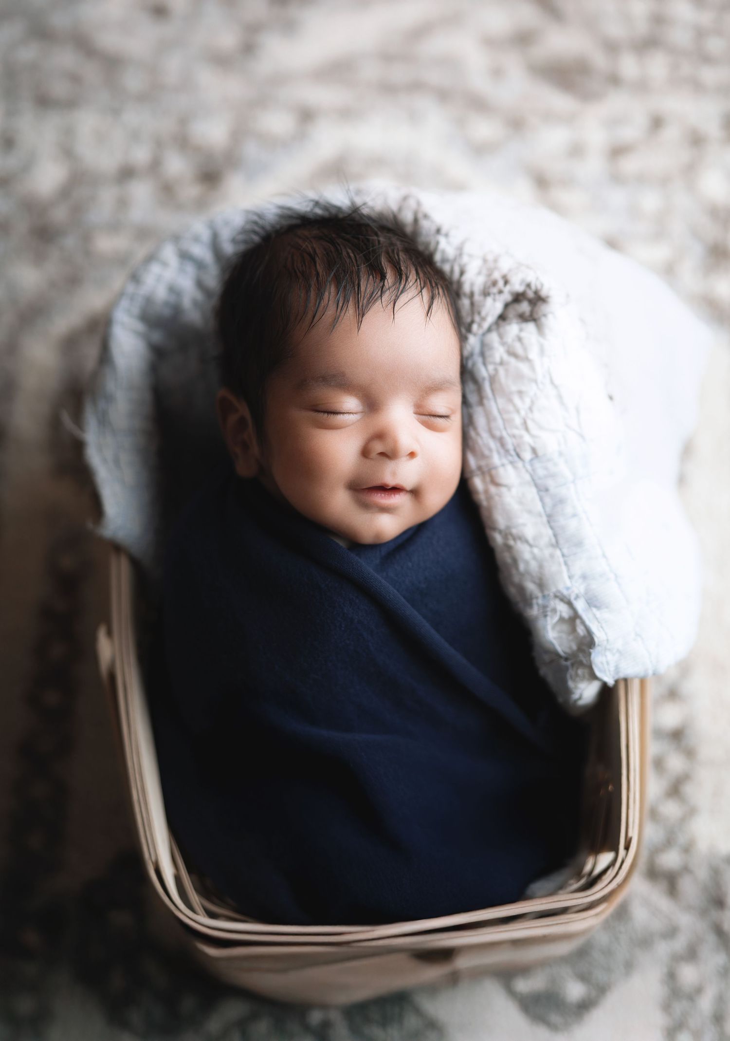 Newborn in basket with cute props, studio photography Madison, Verona, Middleton, Mount Horeb, Sun Prairie, Wisconsin and surrounding area.