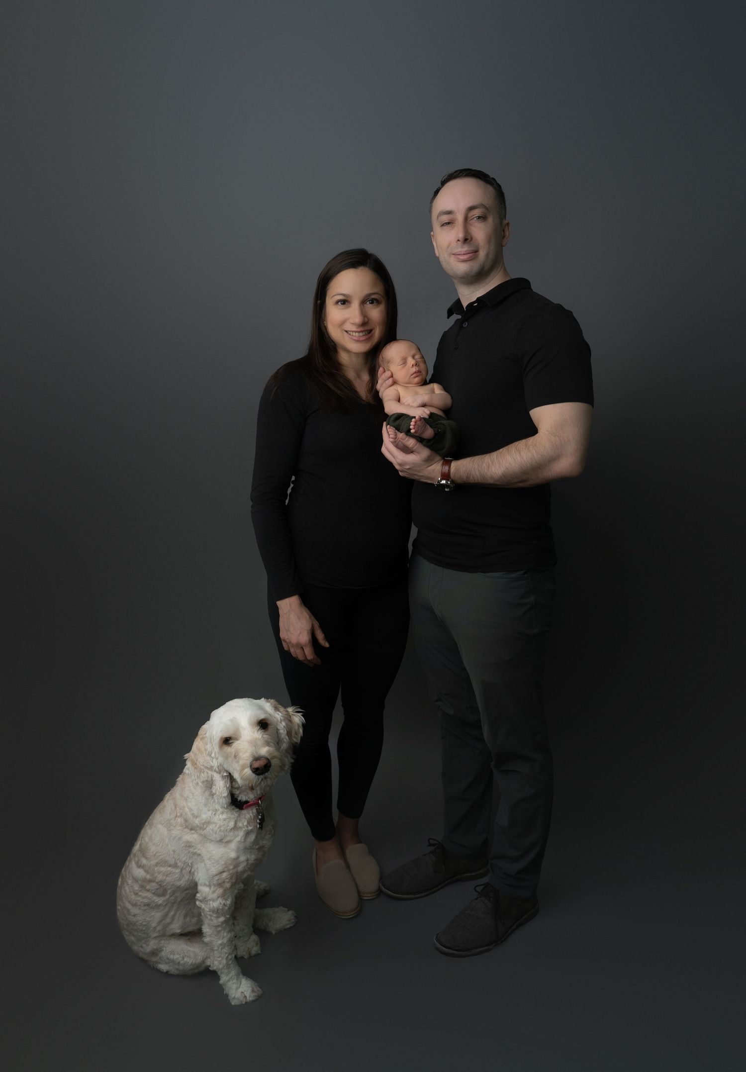 Family newborn photos with dog. Hatched newborn photography. Wisconsin's premiere newborn and maternity photography.