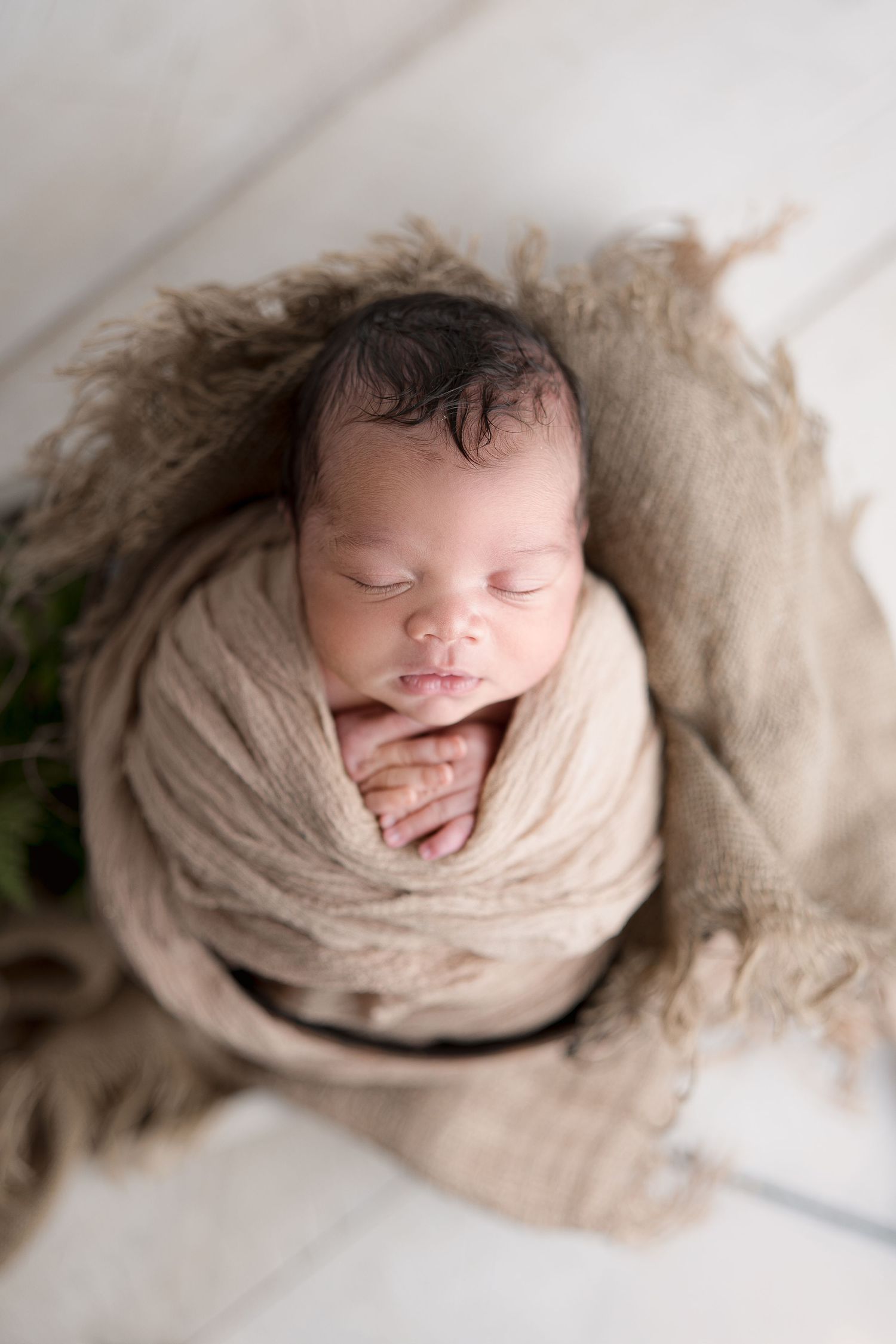 Sleeping baby in a brown basket. Madison, Wi Hatched Newborn Photography. Maternity, Family and Child photos