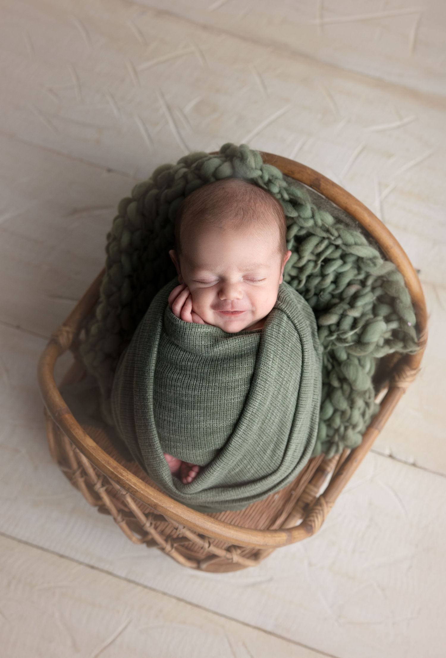 Newborn in basket with cute props, studio photography Madison, Verona, Middleton, Mount Horeb, Sun Prairie, Wisconsin and surrounding area.
