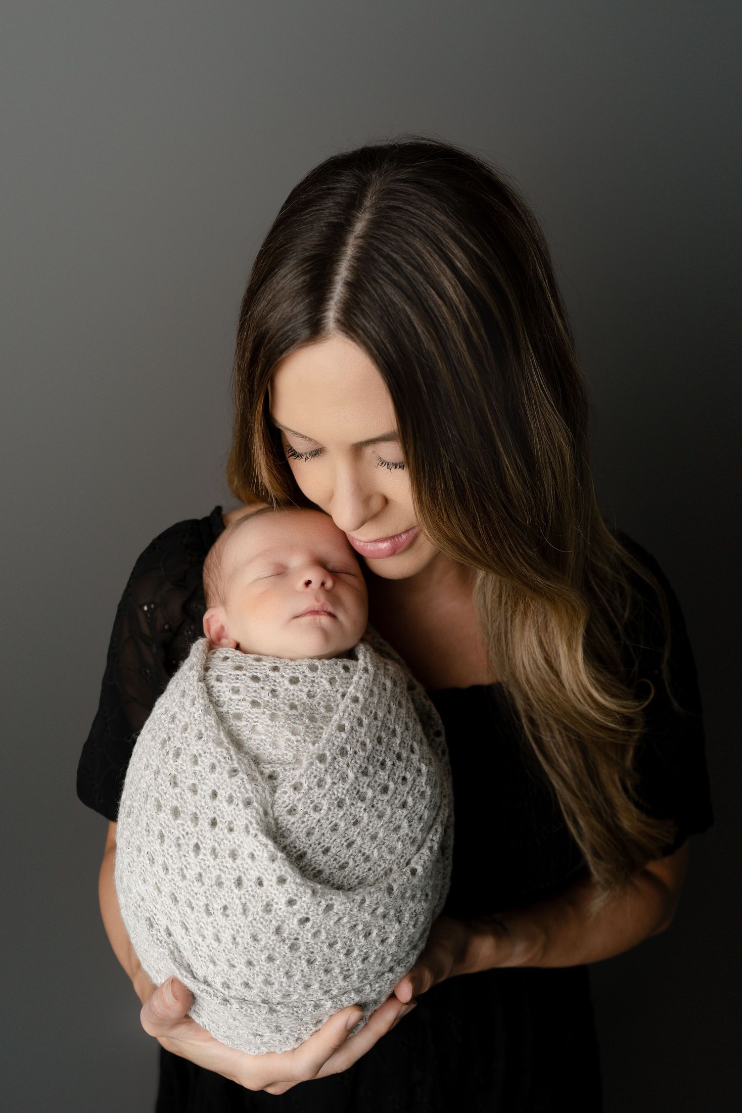 Mother cuddling baby, newborn family session, Madison, WI
