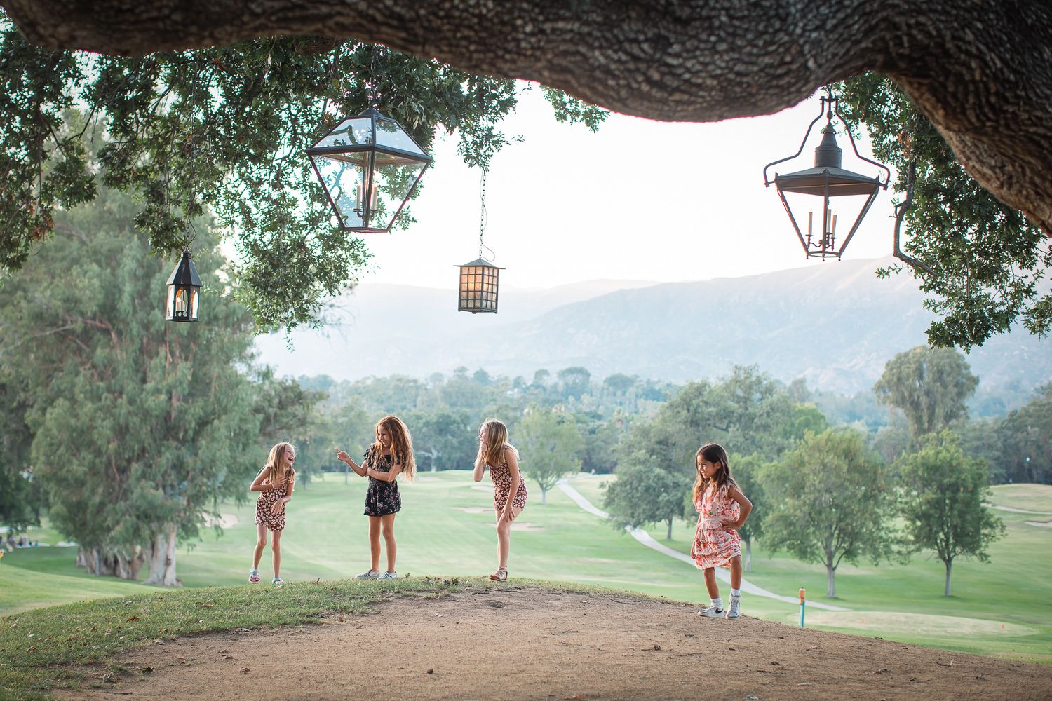 Girls on hill in Ojai. Ojai Valley Inn. California.