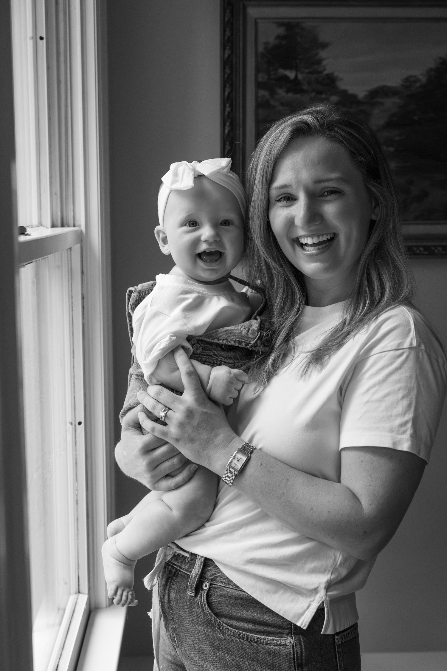A collection of candid black and white photos showing tender moments by a window.