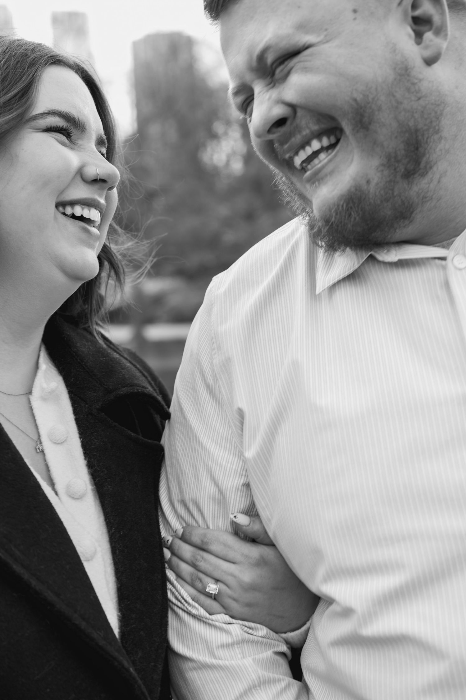 Black and white close-up photos showing tender moments of affection and laughter.