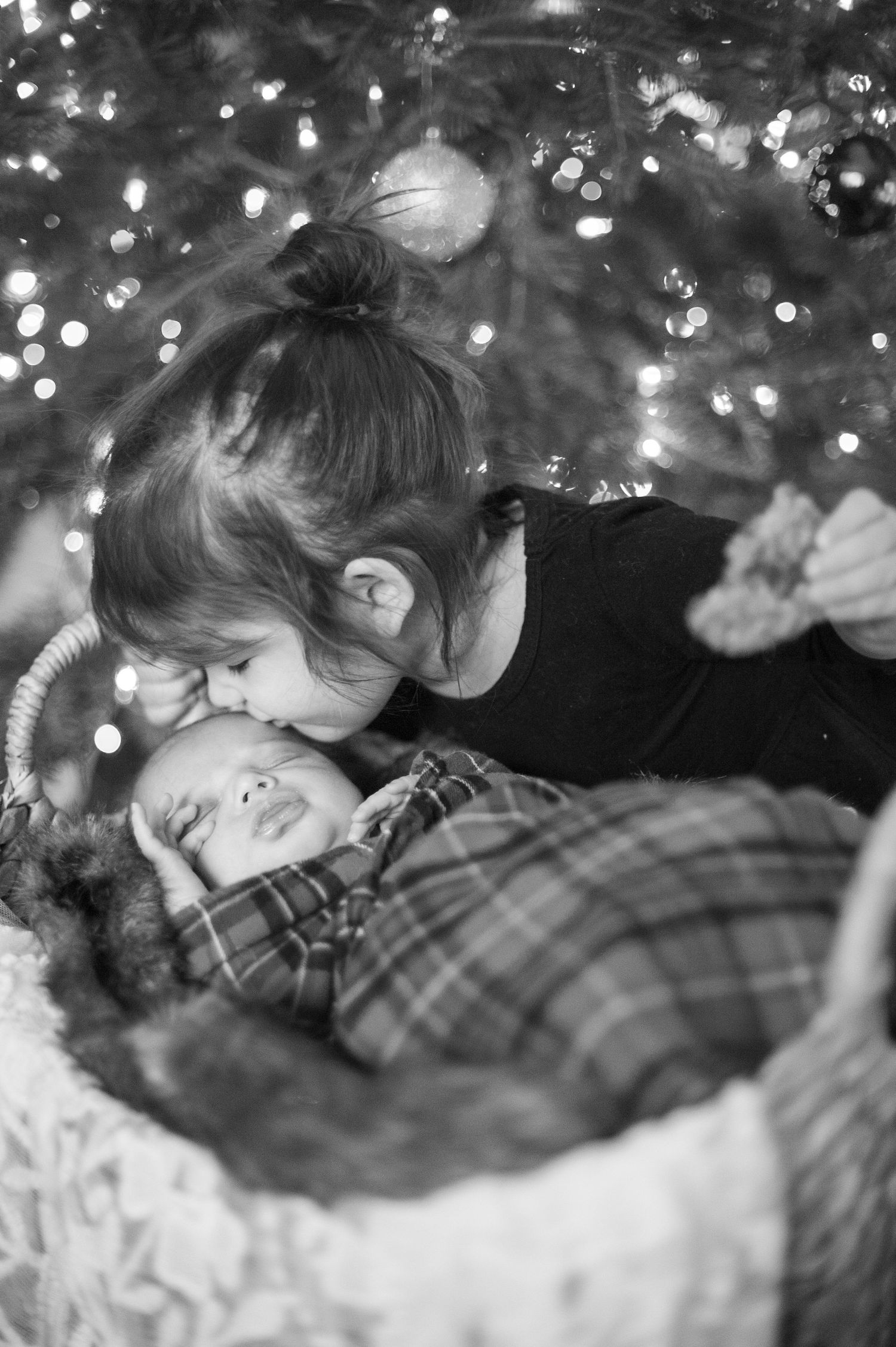 Dreamy black and white photo with bokeh lights and soft textures.