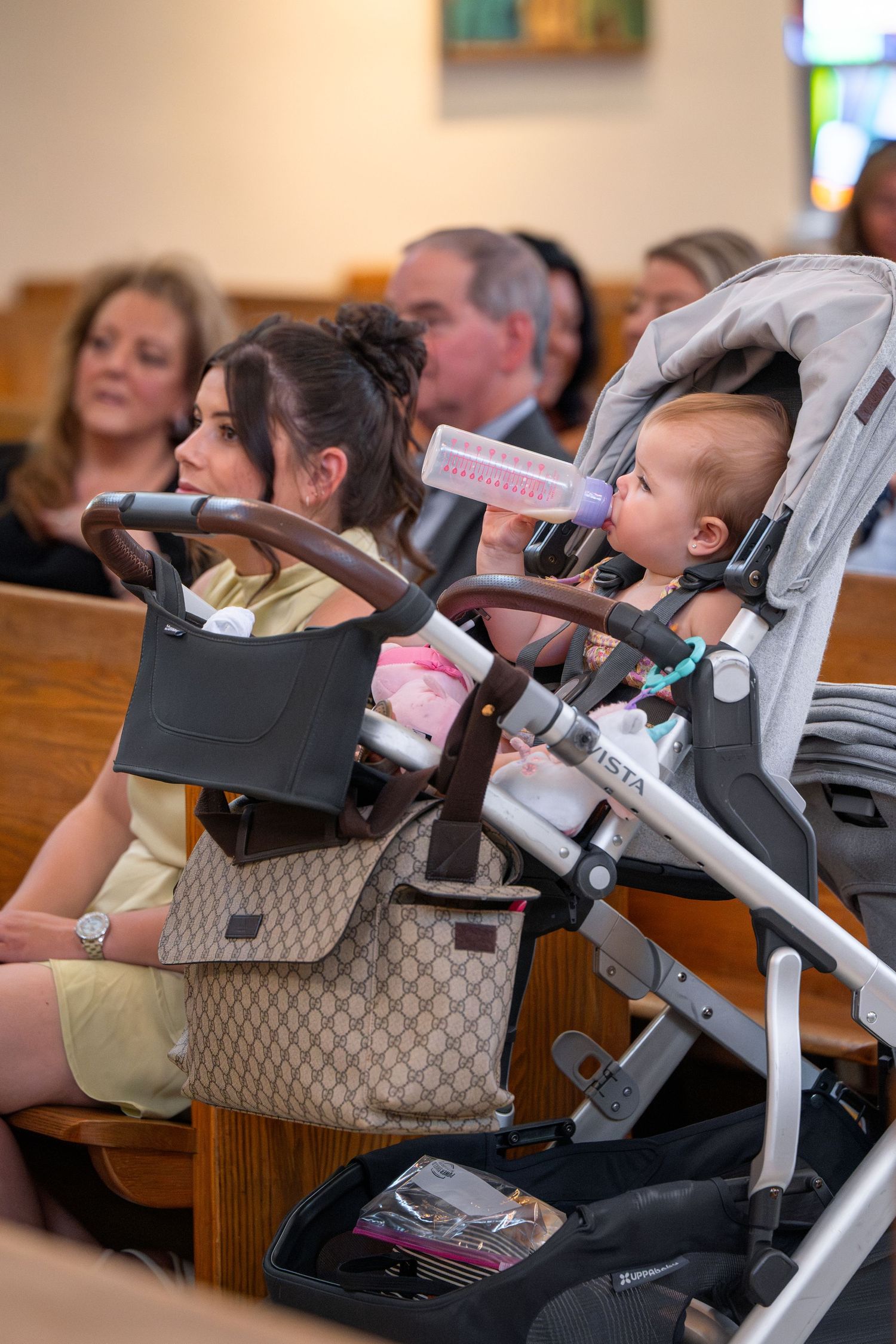Sequence of images showing a baby sleeping in a stroller during church service.
