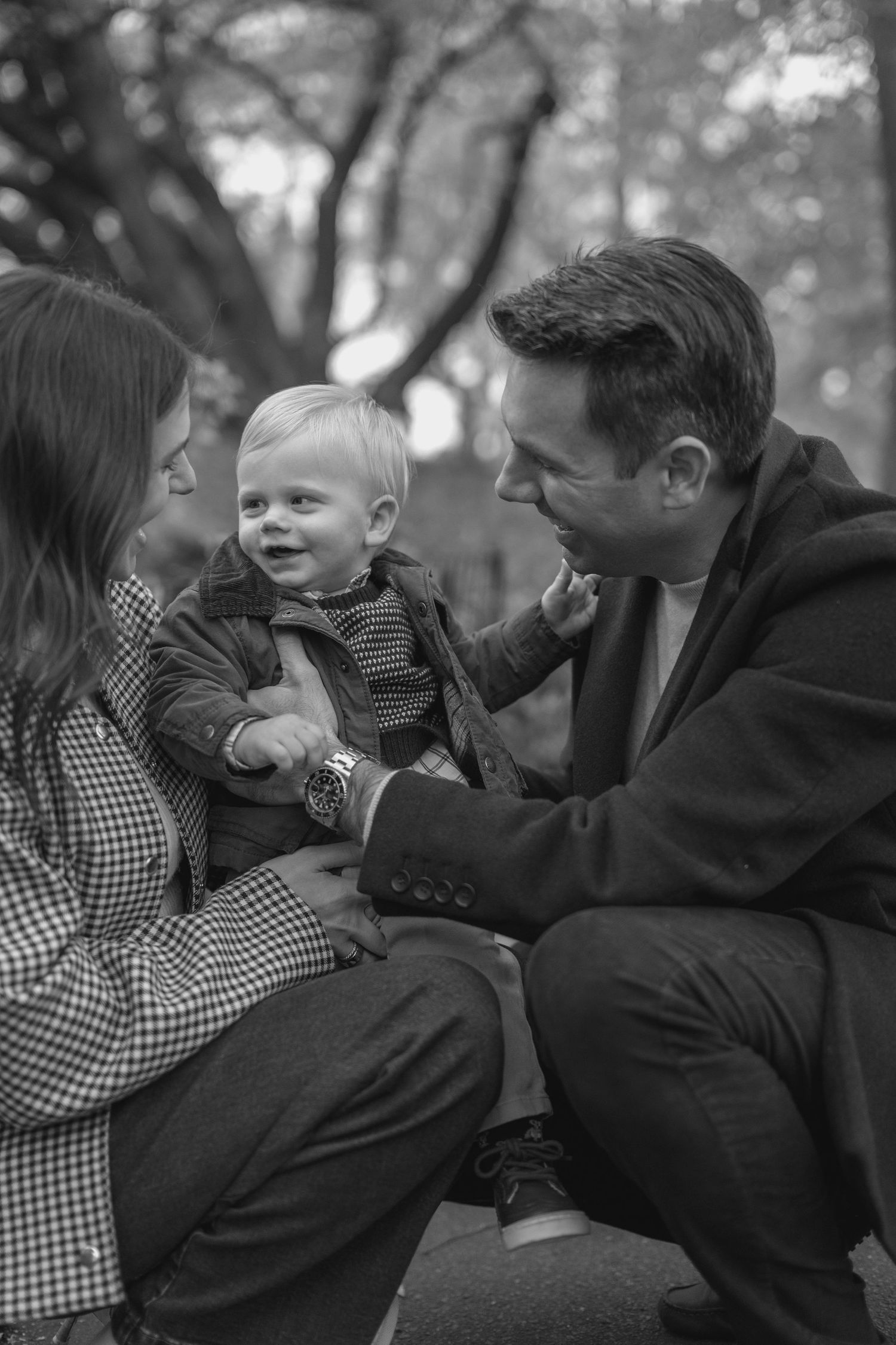 Black and white candid family photo sequence showing natural interactions outdoors.