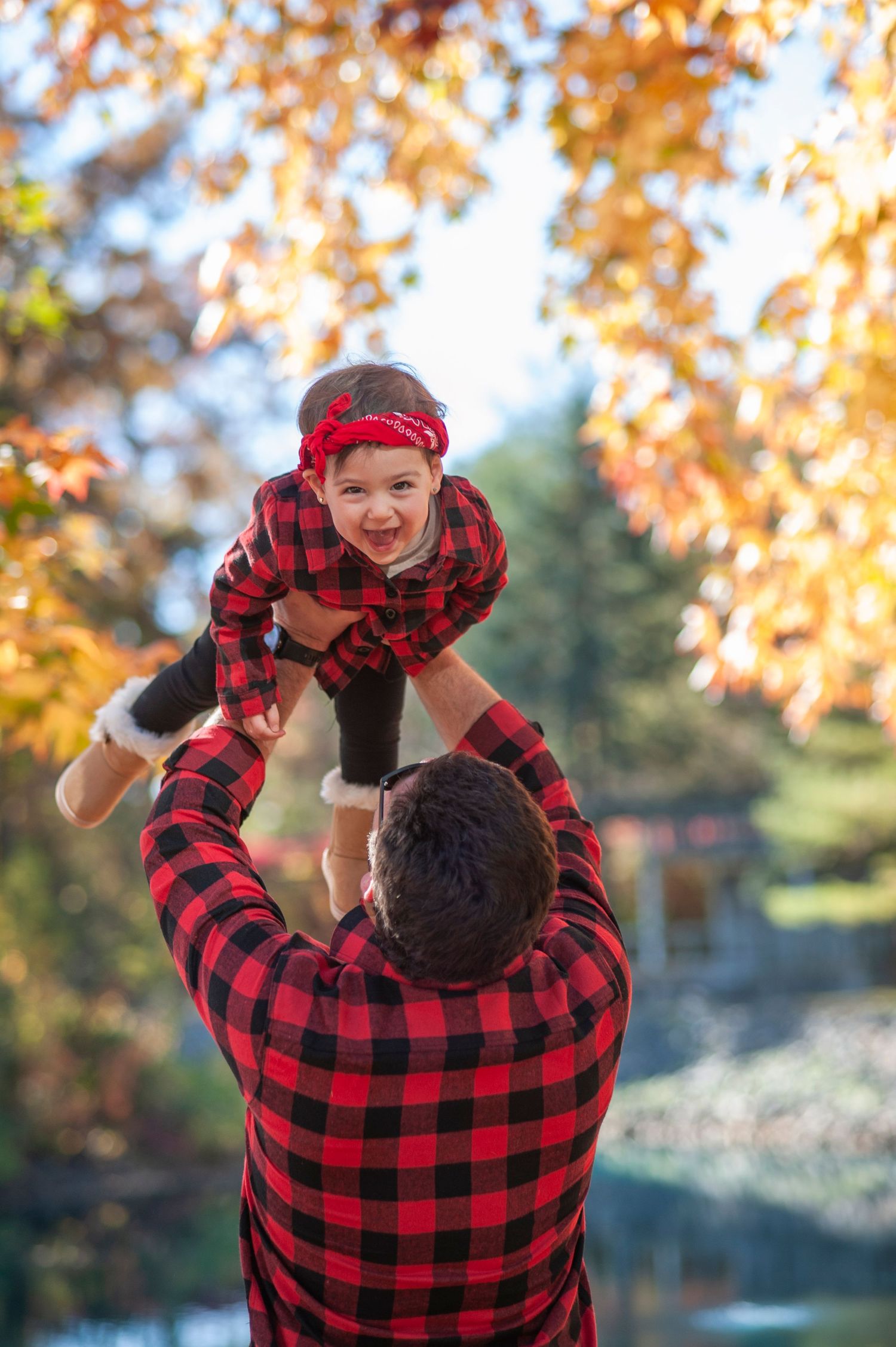 A playful series of photos showing a person in a red plaid shirt against autumn foliage.