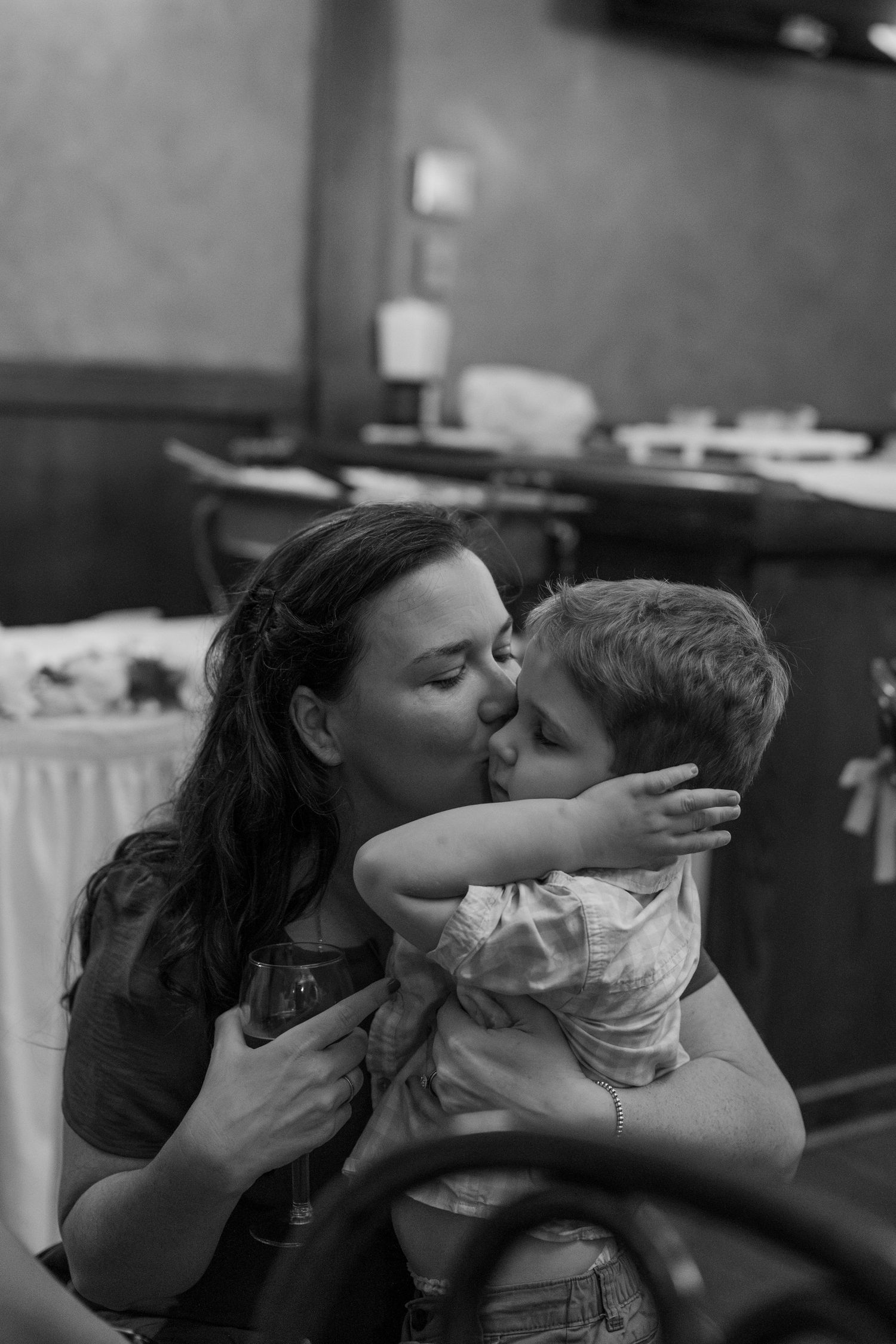 A tender moment captured in black and white during a special celebration.