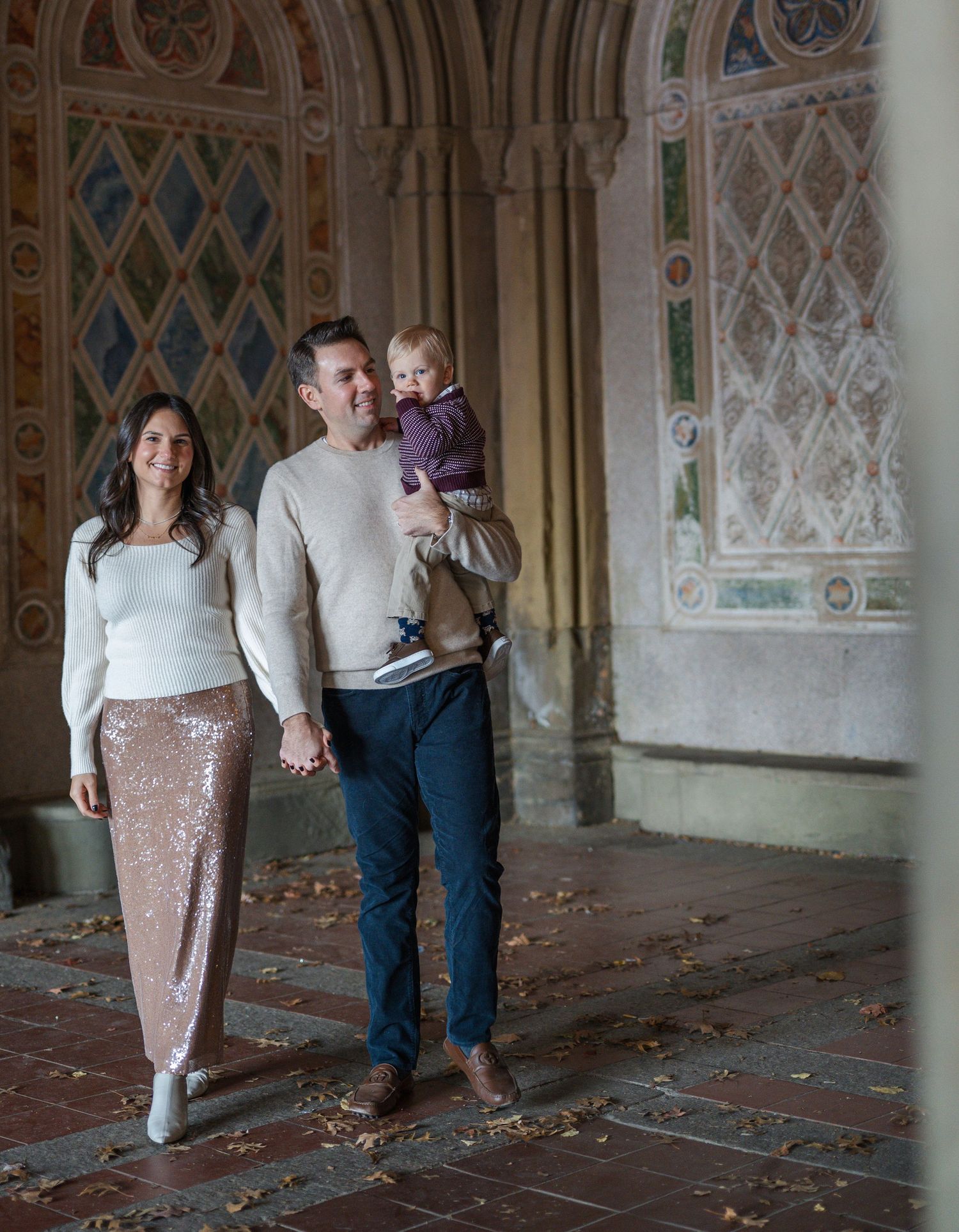 Artistic sequence showing couple's feet walking through an ornate architectural space.