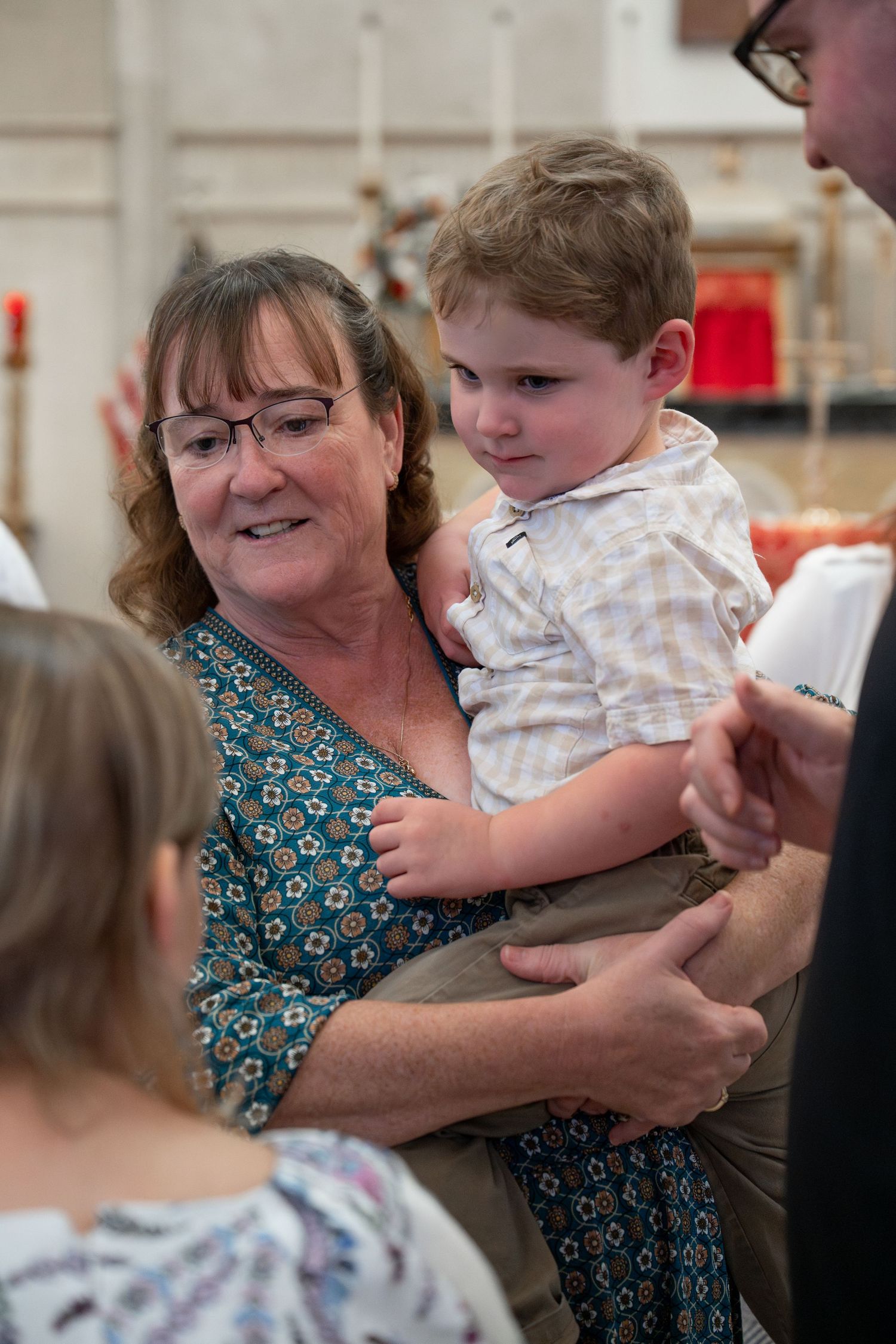 A series of photos showing warm family interactions during a special celebration event.