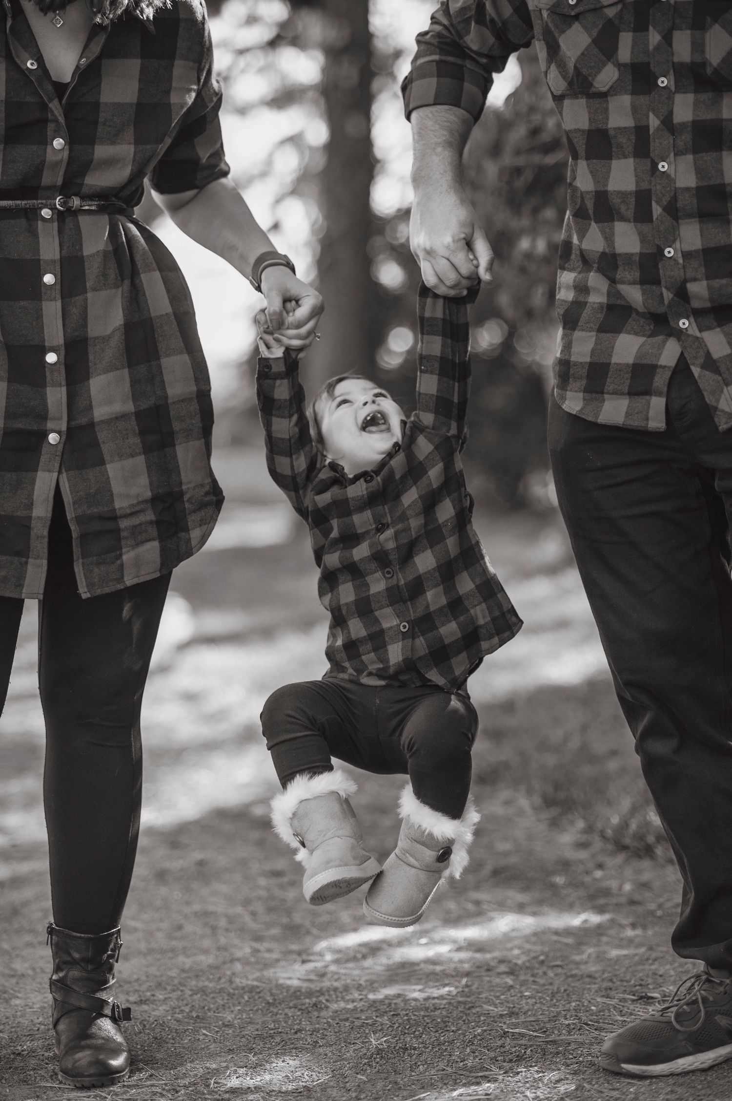 Close-up shots of feet walking together showing matching buffalo plaid and denim outfits.