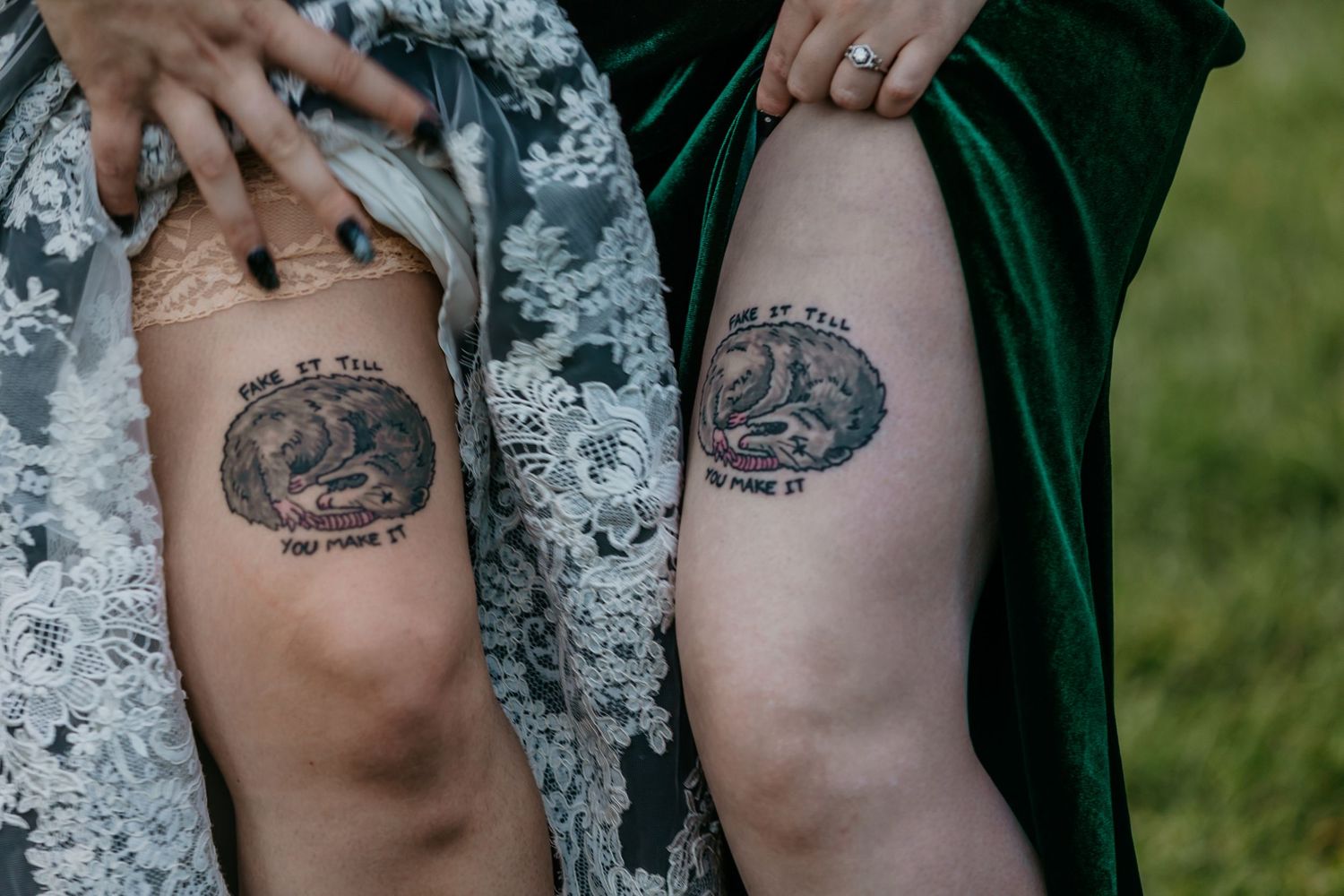 Close-up of matching tattoos displayed on wedding party members' legs.