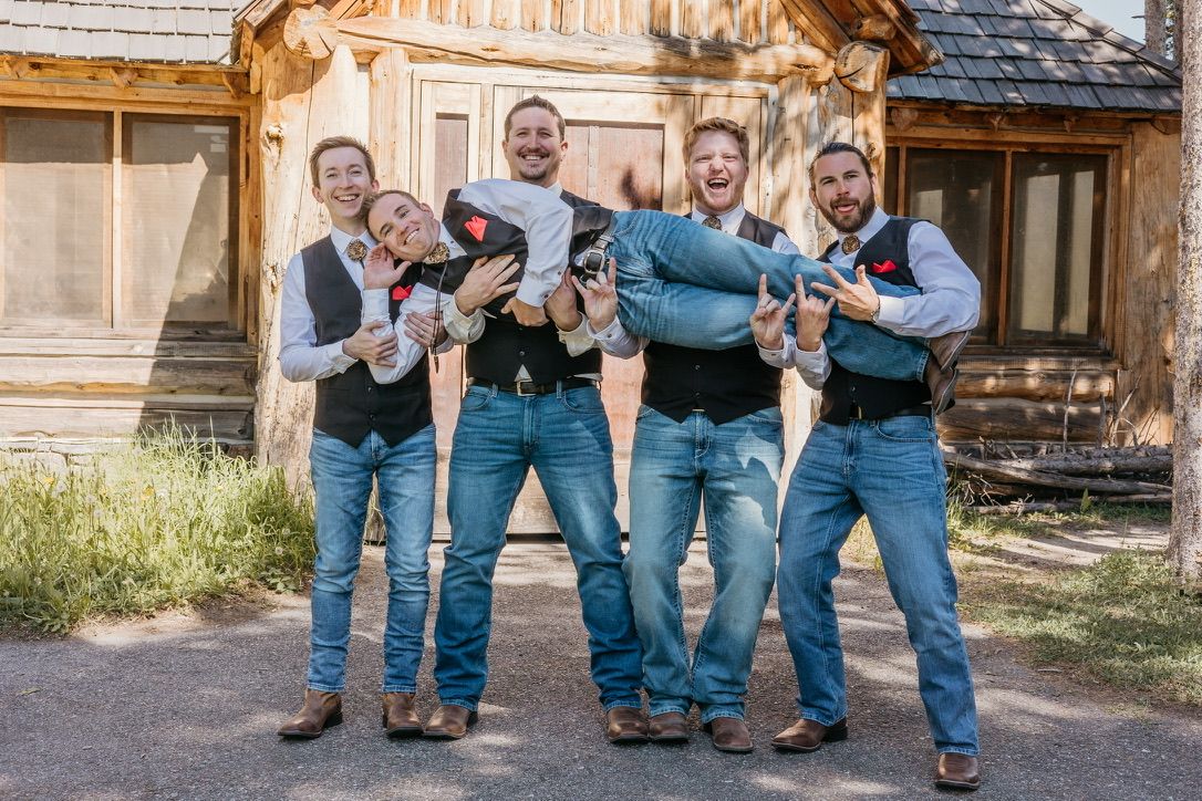 Casual group photos in coordinated denim and blue attire against rustic building.