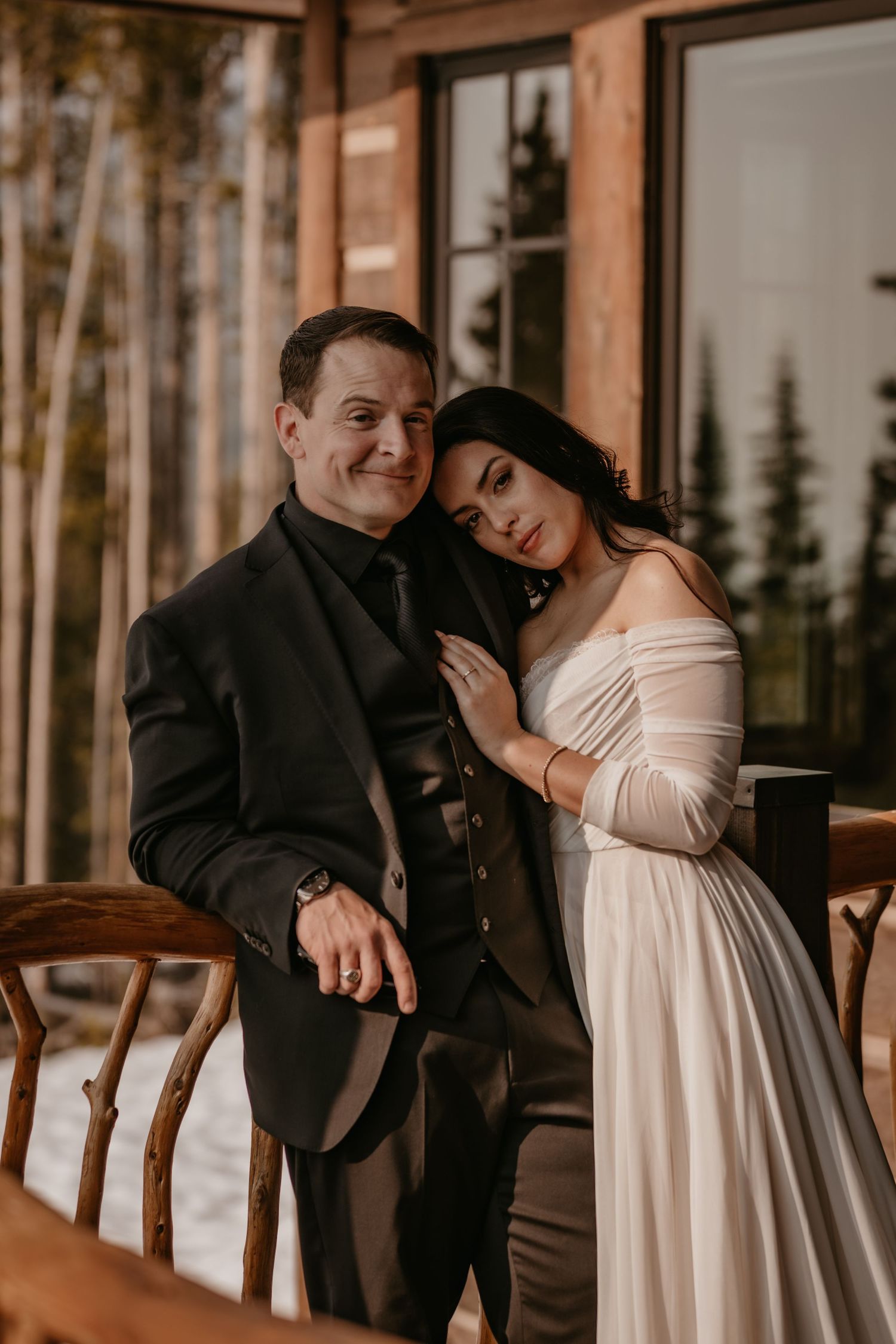 Intimate wedding portraits captured indoors showing tender moments between newlyweds.