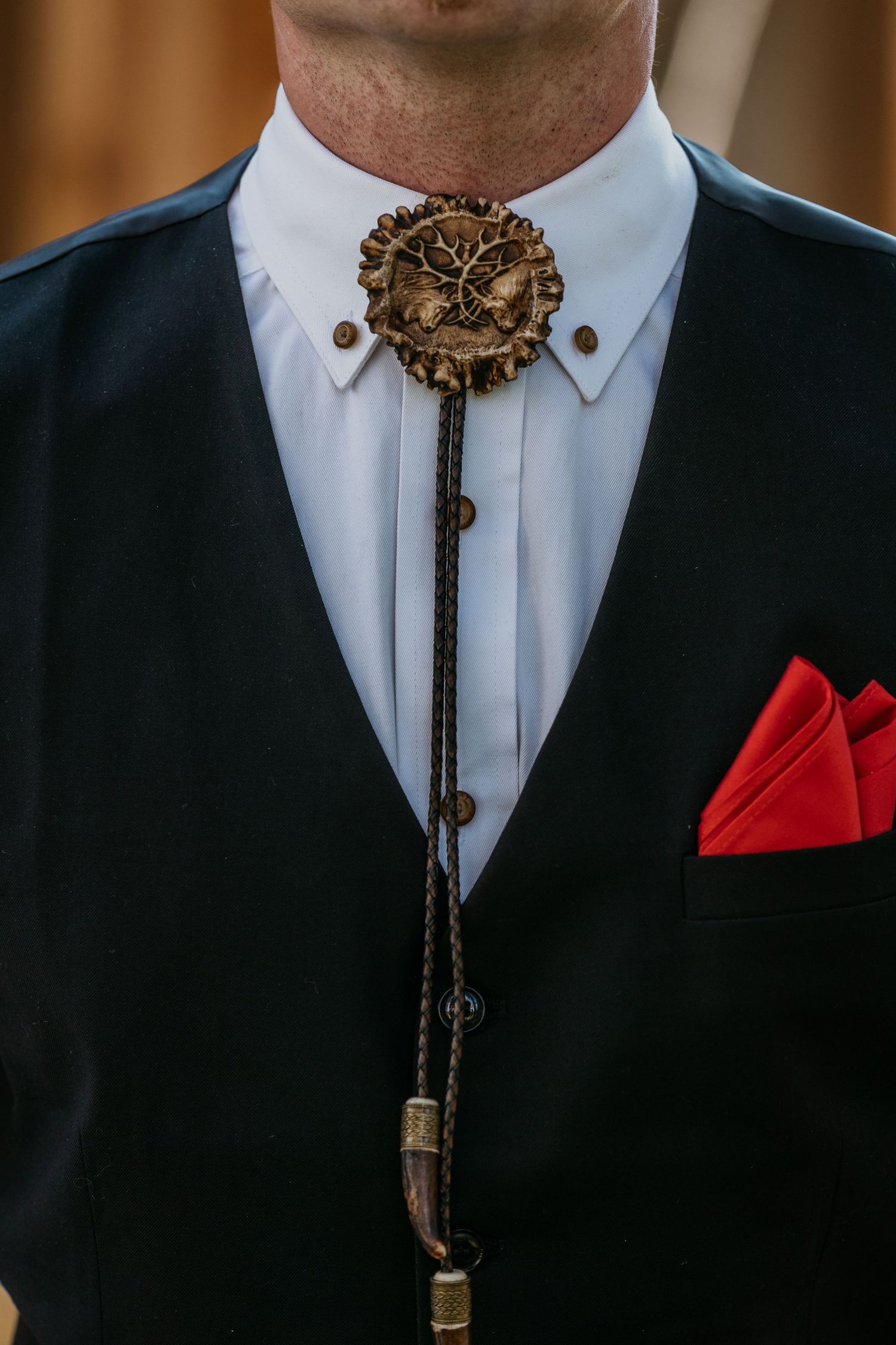 Detail shots of formal western bolo ties and suit accessories.