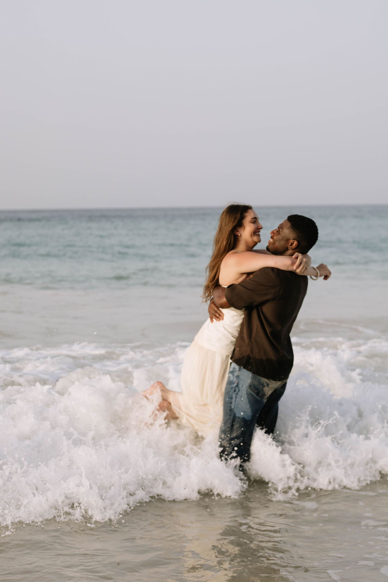 Romantic engagement session in Punta Cana featuring natural moments, golden light, and breathtaking Caribbean beach scenery.
