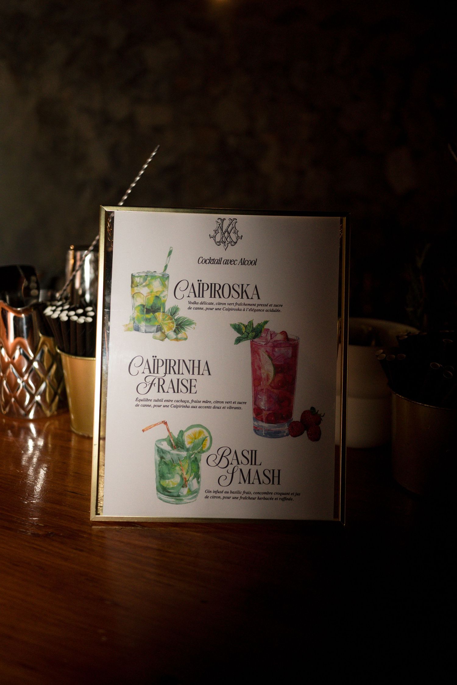 Wedding cocktail menu displaying Caipiroska, Caipirinha Fraise, and Basil Smash drinks.
