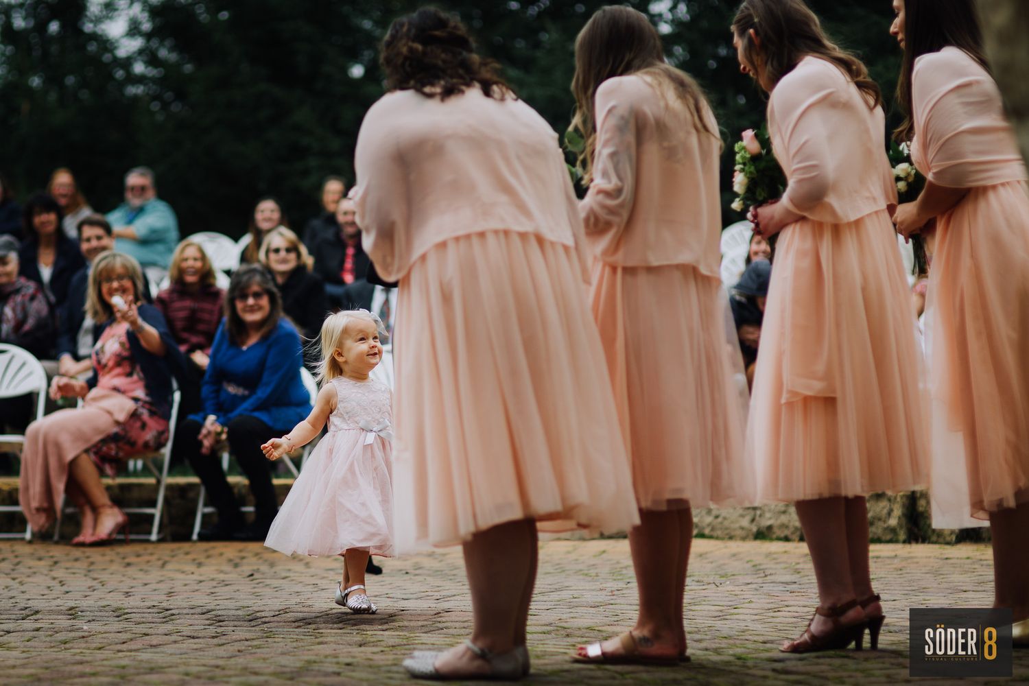 bridesmaids and flower girl during wedding ceremony