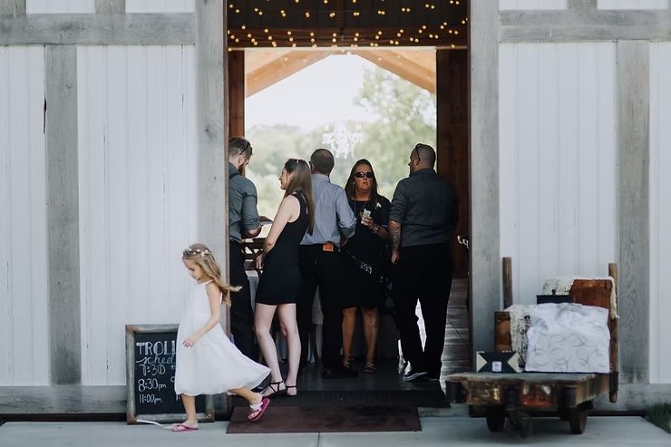 iowa barn wedding guests having fun