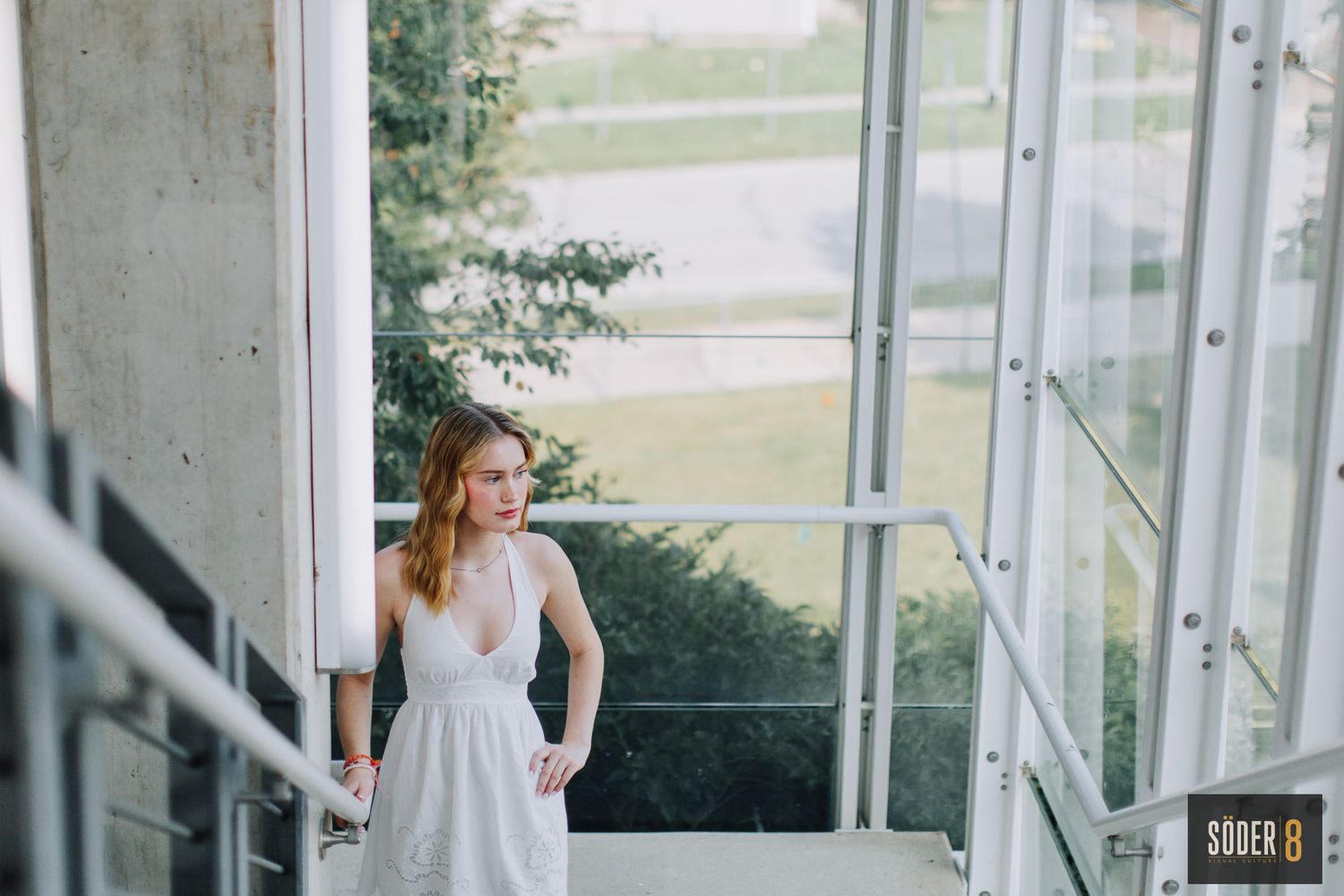 girl standing in stairwell