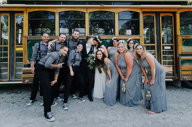 diamond oak trolley bus and lgbtq wedding couple and party