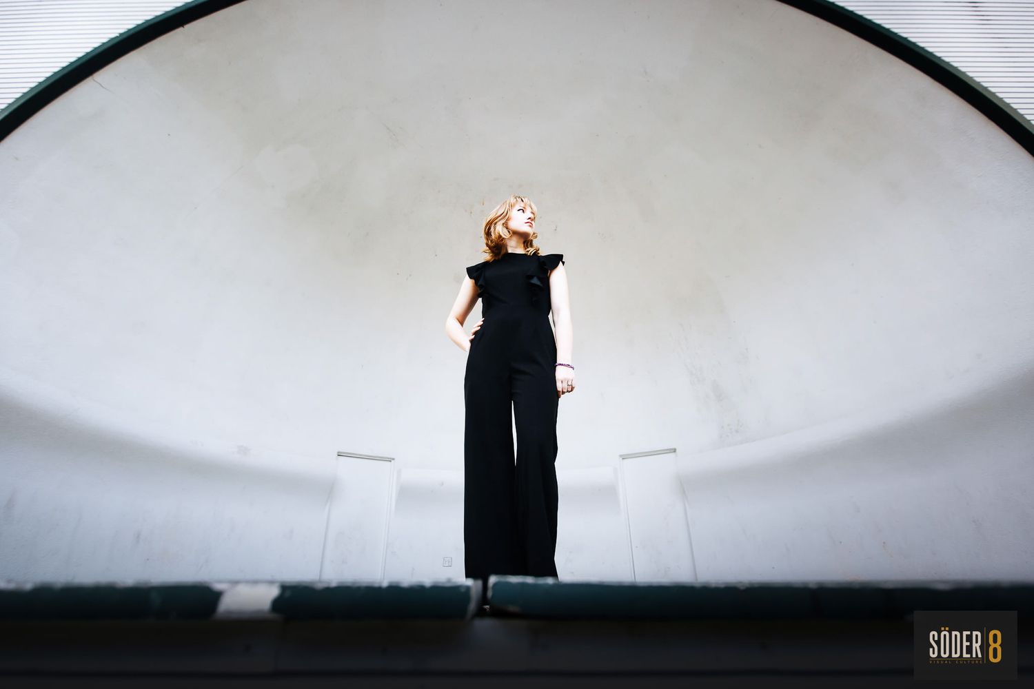 high school senior girl with dramatic pose in a band shell in mason city, iowa - soder 8
